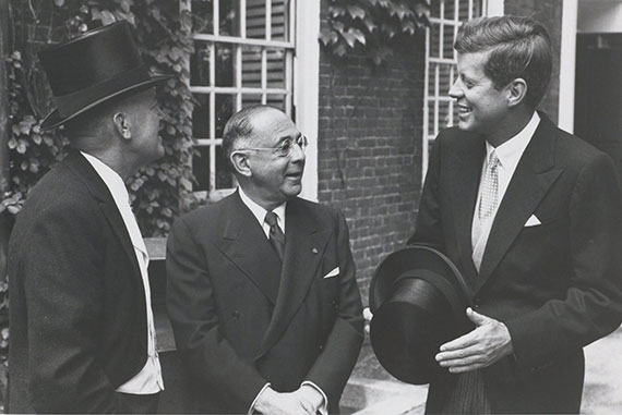 In 1959, Sen. John F. Kennedy, Class of 1940, attended Harvard's Commencement. Kennedy spoke with Harvard Treasurer Paul C. Cabot (left) and Sidney Weinberg, senior partner at Goldman Sachs, who received an honorary degree that day.