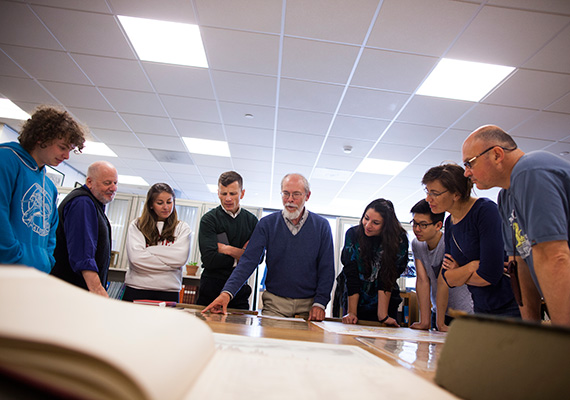 Research librarian Joseph Garver (center) provides historical context during a presentation to Gabriel Jandali-Appel ’16 (from left), Stephen Prina, Monica Palos ’15, Jesse Aron Green, Deborah Montes '16, Michael Wang '14, Leonie Marinovich, and Greg Marinovich.