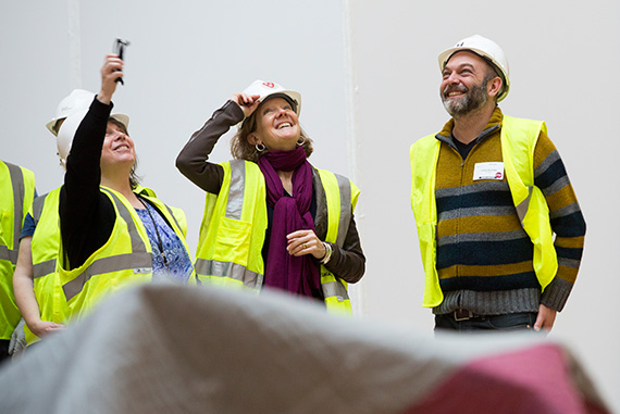 Harvard Art Museums' Richard L. Menschel Curator of Photography Deborah Martin Kao (from left),  Associate Curator of Modern and Contemporary Art Mary Schneider Enriquez, and artist Carlos Amorales watch the action. 