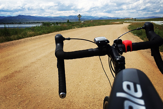 July 15: From the perspective of his bike's handlebars, MIT student Drew Bent '18 looks at the road ahead — a familiar view since June.