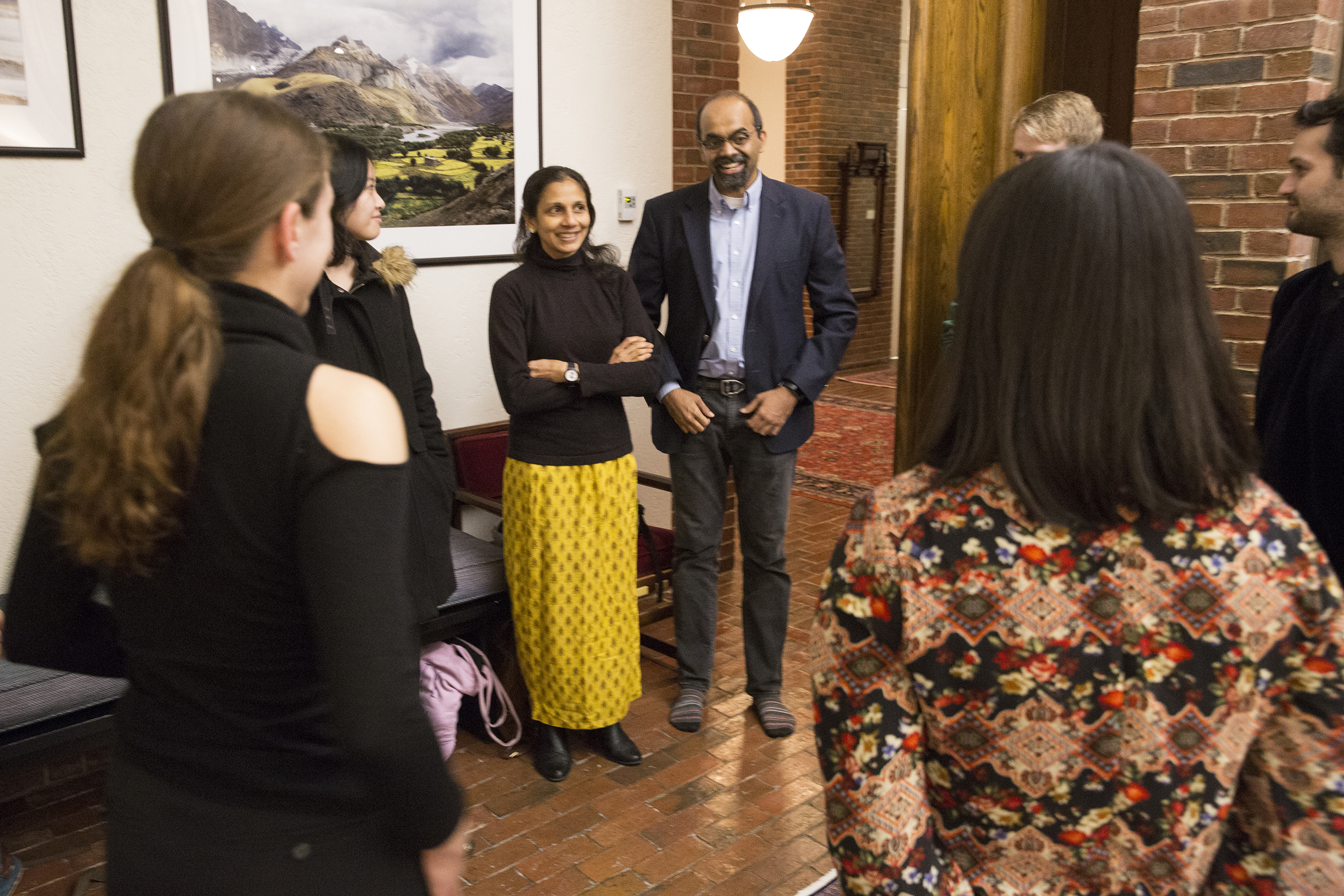 Harvard Faculty Deans L. (Maha) Mahadevan and Amala Mahadevan speak with members of the American Modern Opera Company.