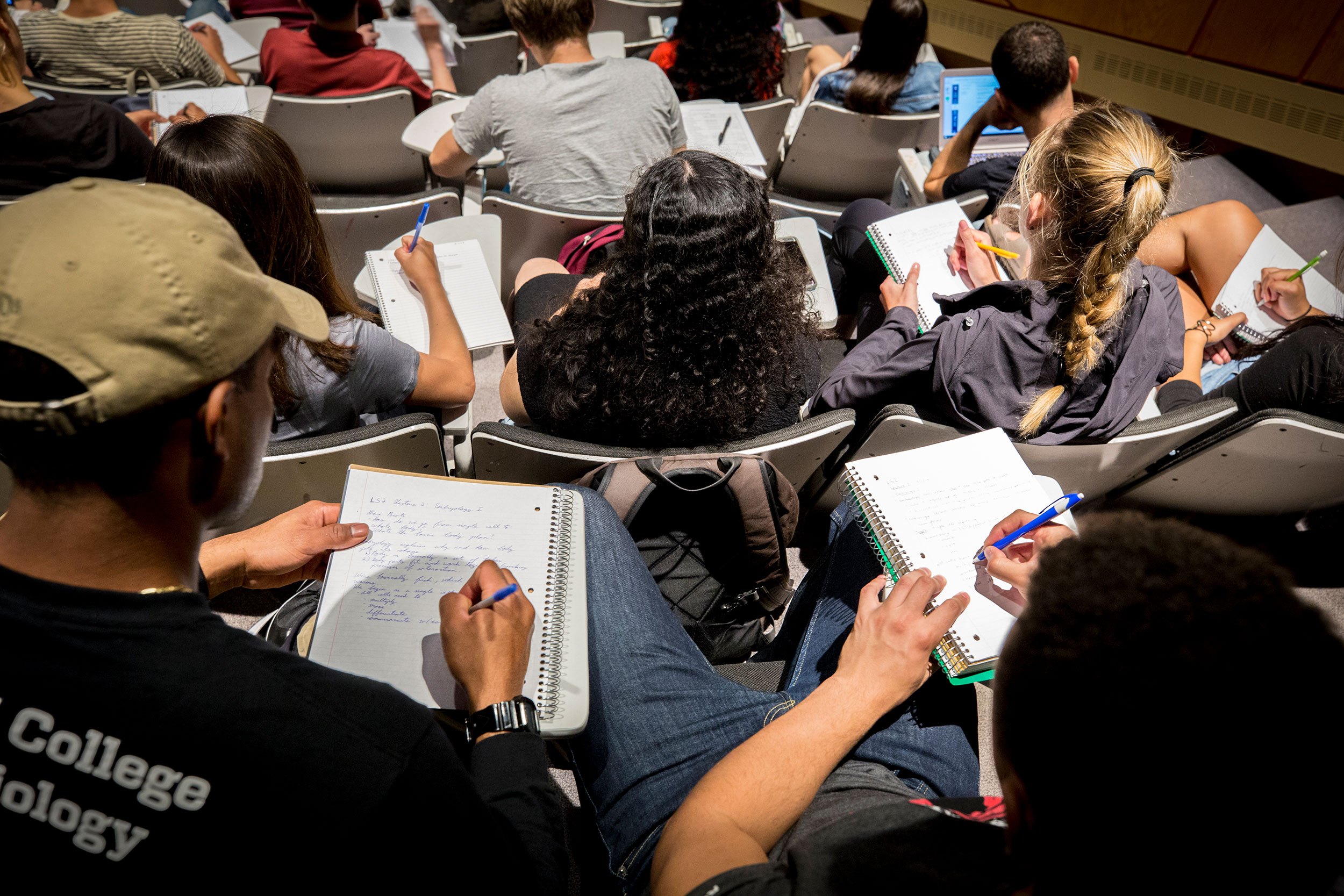 Students taking notes