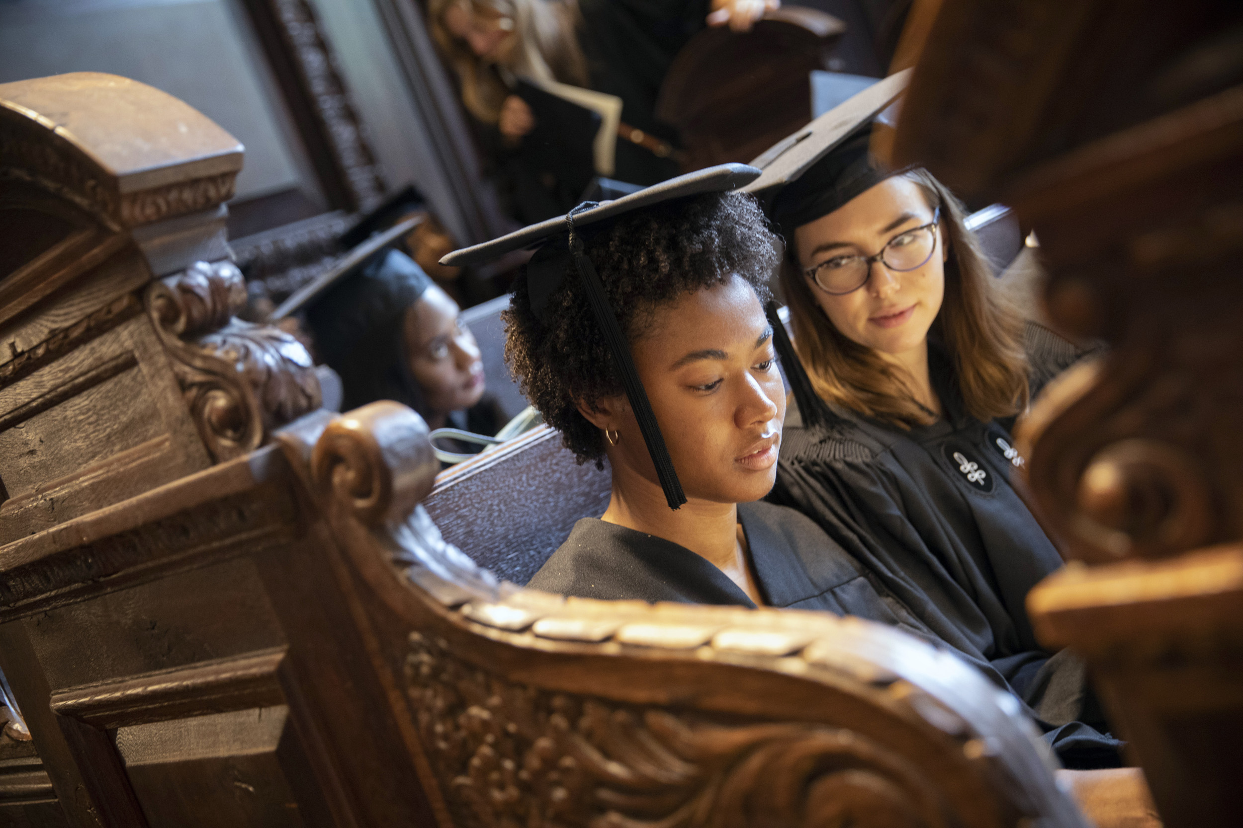 Students Claire Townsend and Margot Mai at baccalaureate service.