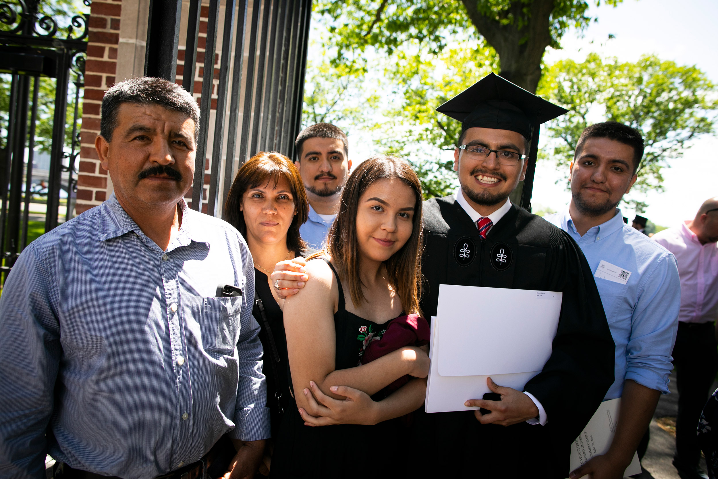 Salvatore and Francisca Gomez pose with their children Ismael, Emily, newly minted graduate Gillermo, and Salvador Jr.