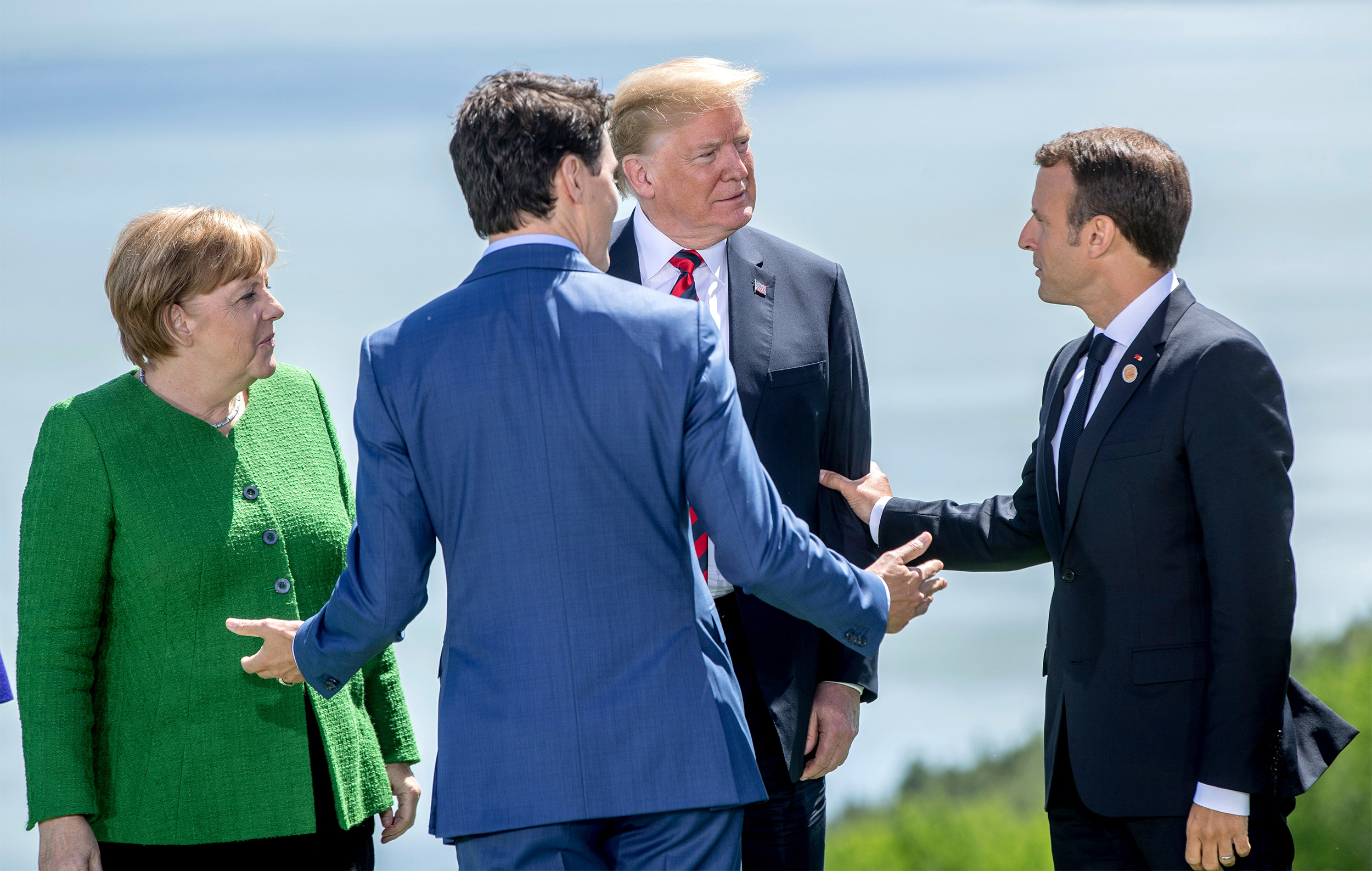 Angela Merkel, Justin Trudeau, Donald Trump, and Emmanuel Macron at the G7 summit.