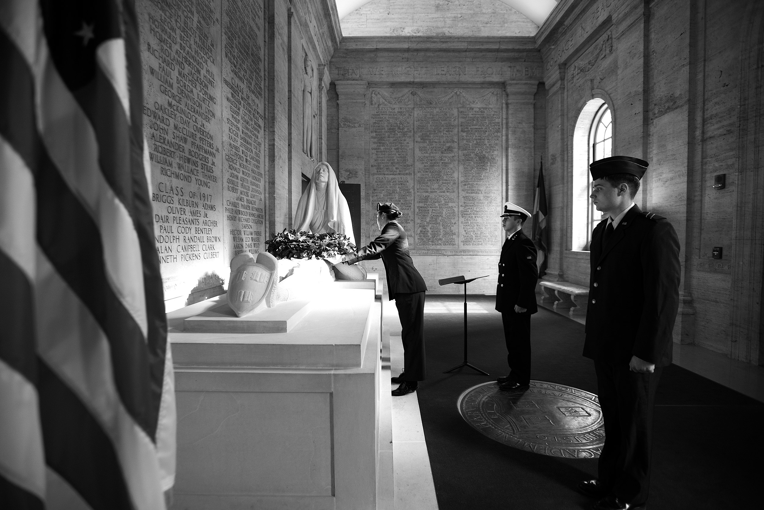 Members of Harvard's ROTC lay a wreath on the sculpture "The Sacrifice"