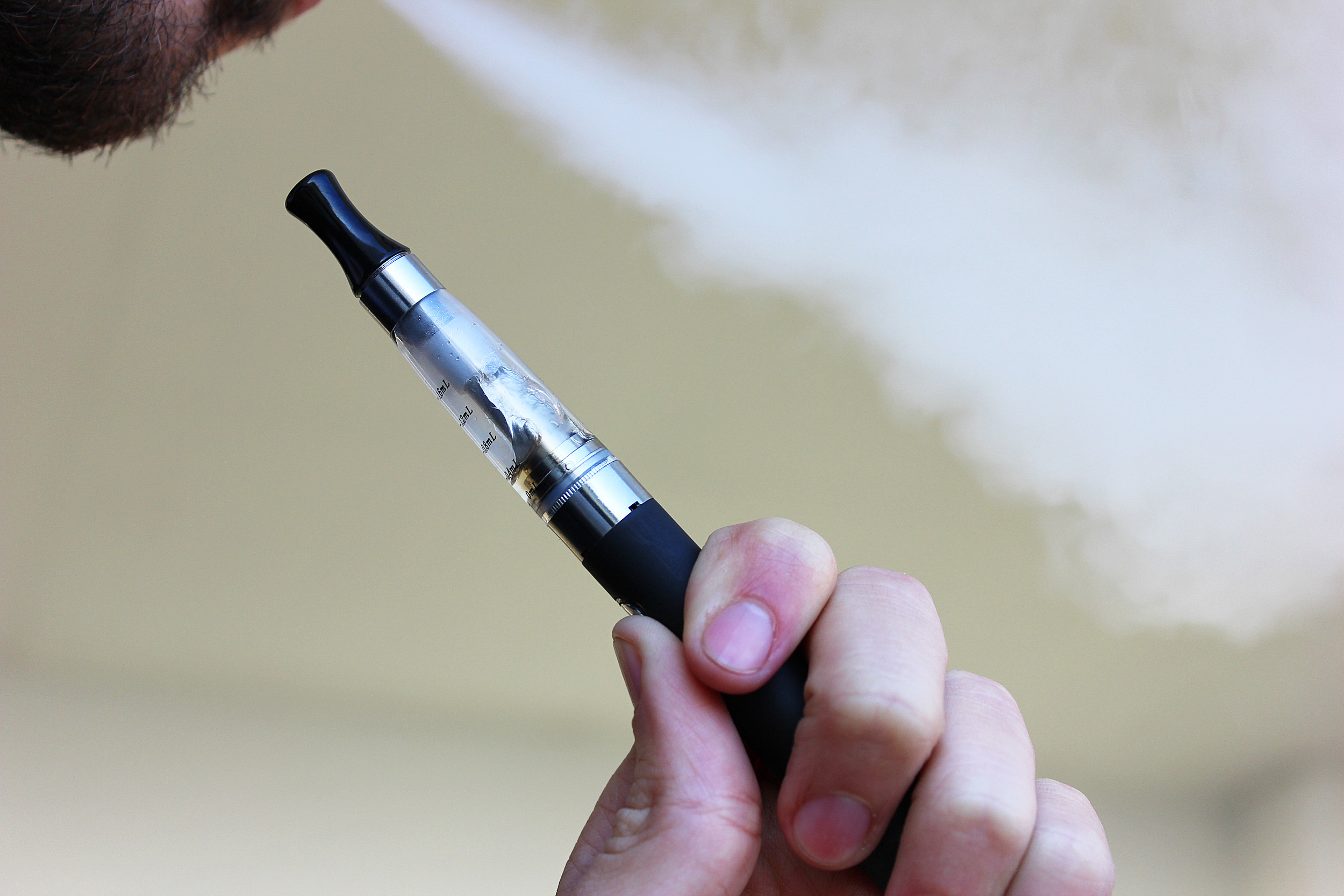 A vape pen and vape smoke