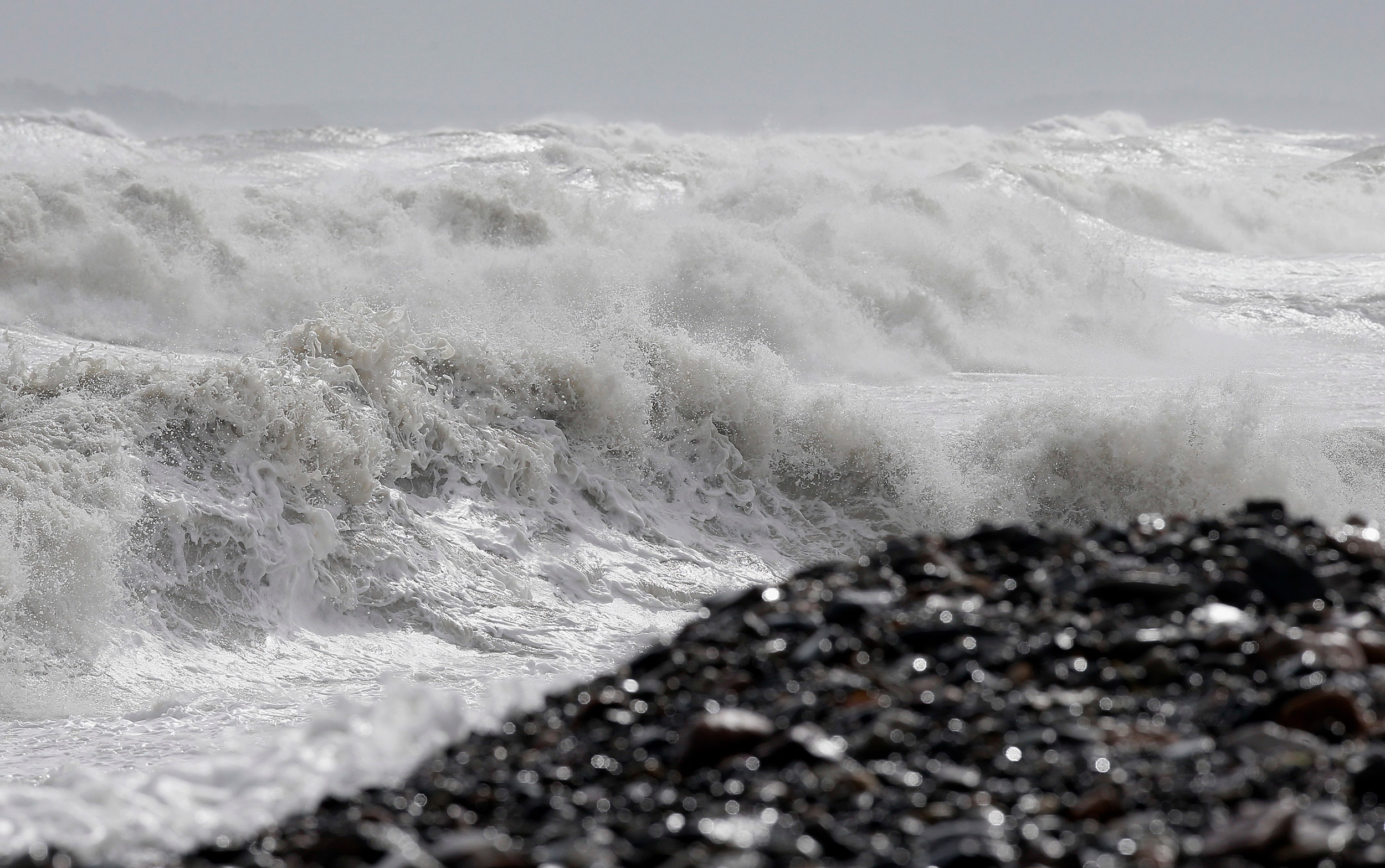 Heavy seas come ashore in Massachusetts.