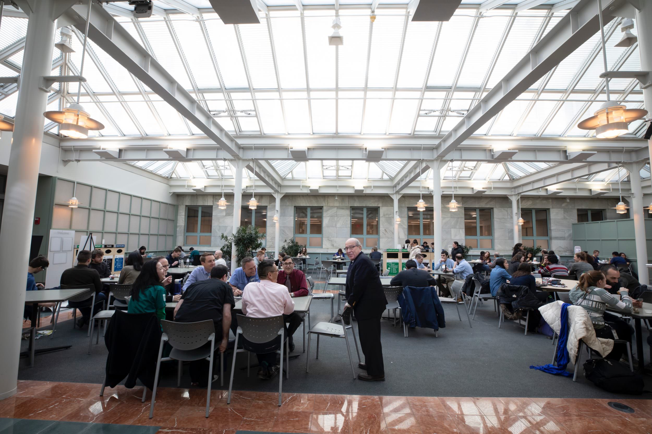 A group gathers for lunch at the Courtyard Cafe.