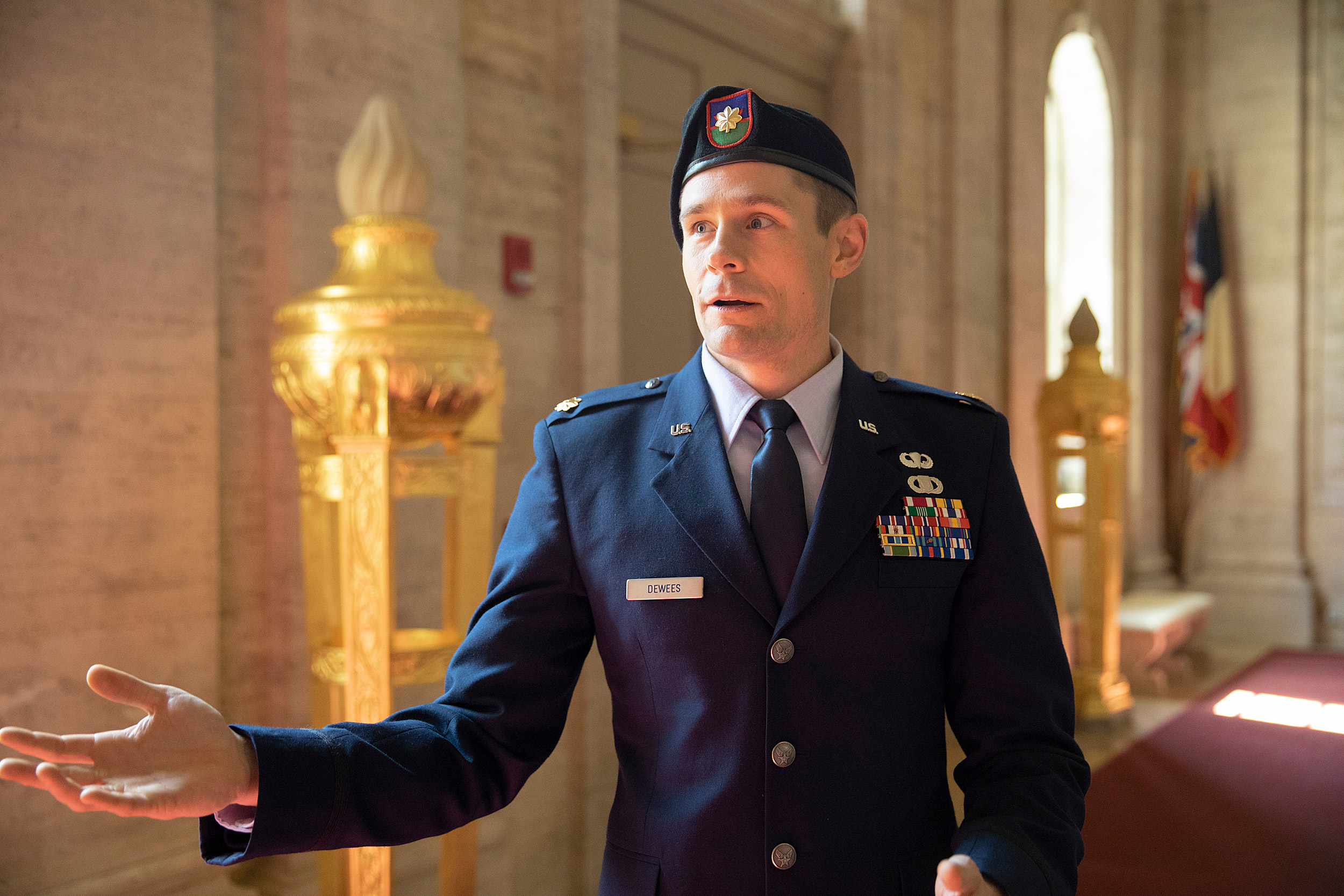 Capt. Bradley DeWees visits the Memorial Church where the names of Harvard veterans are inscribed on the walls.