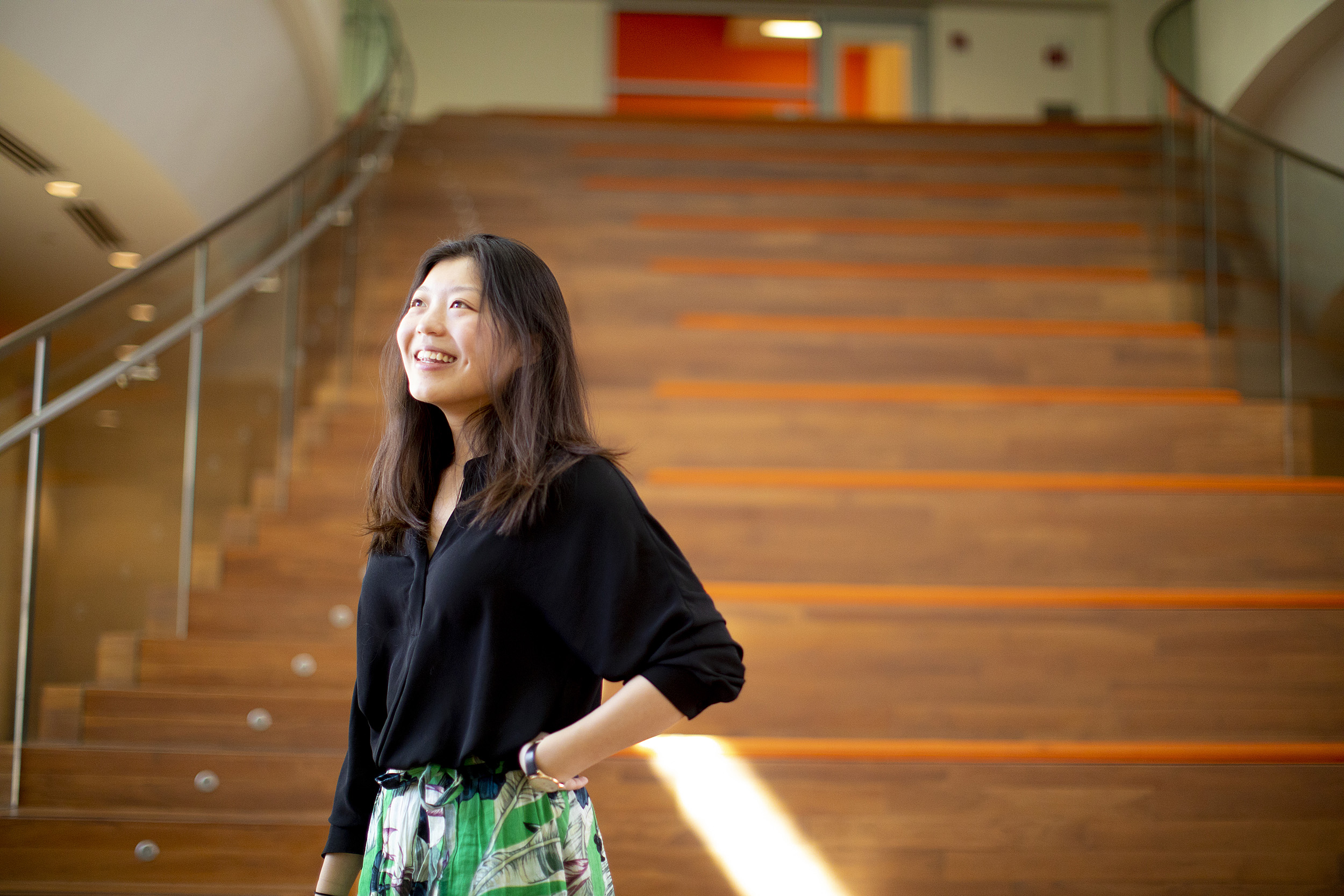 Cynthia Luo in front of stairs