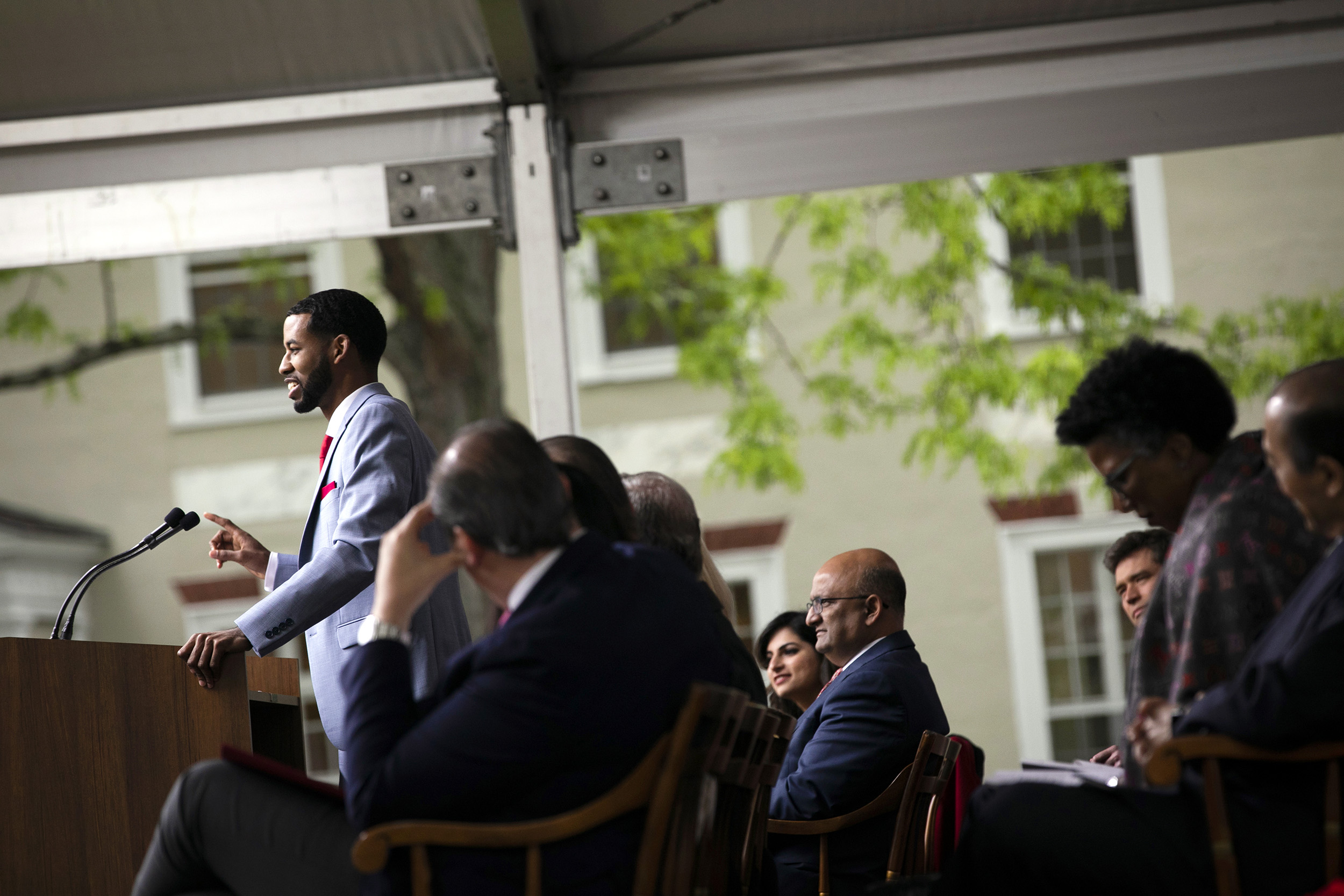 Brandon Rapp speaks from the podium during Class Day at Harvard Business School.