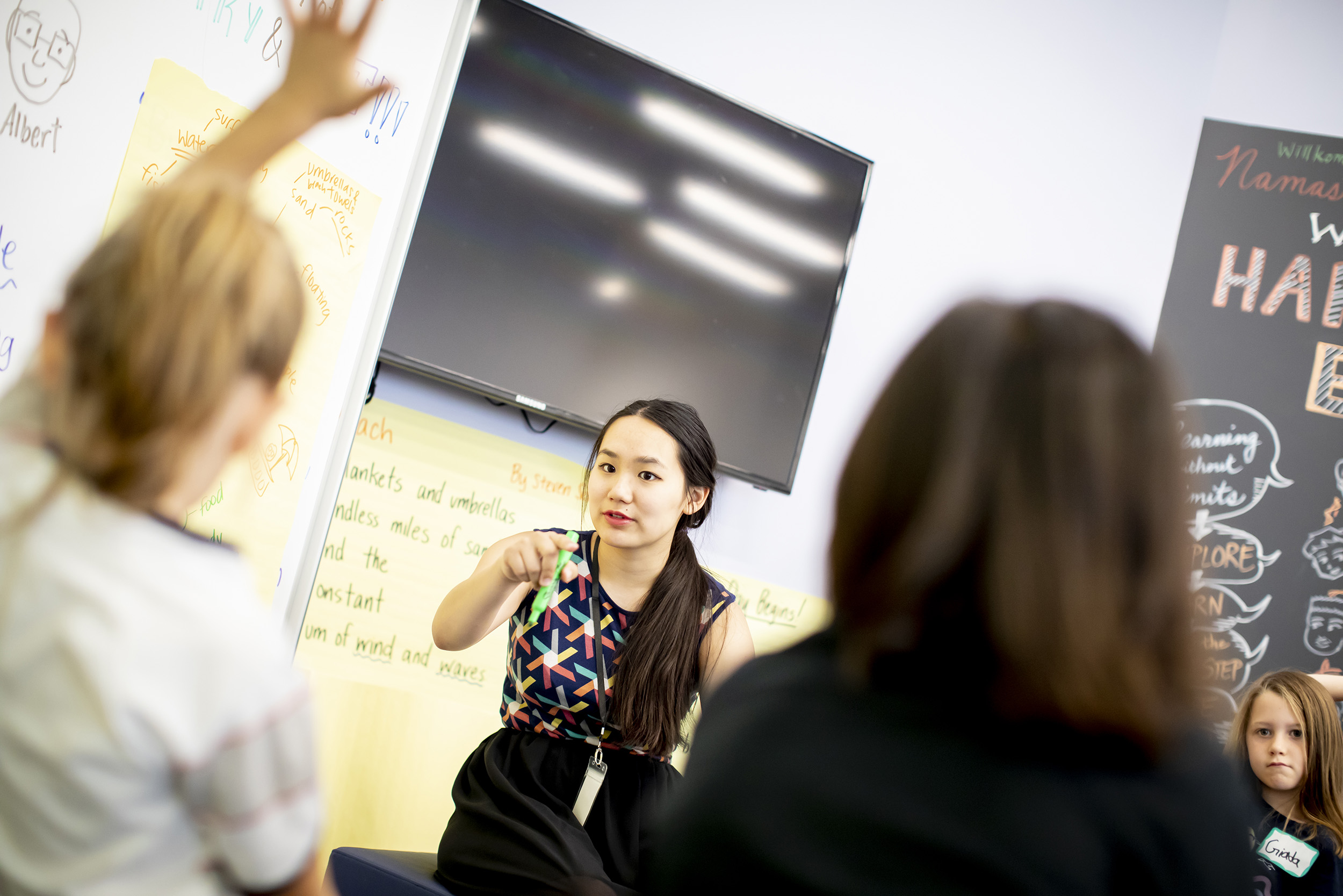 Michaella Chung points during poetry class.