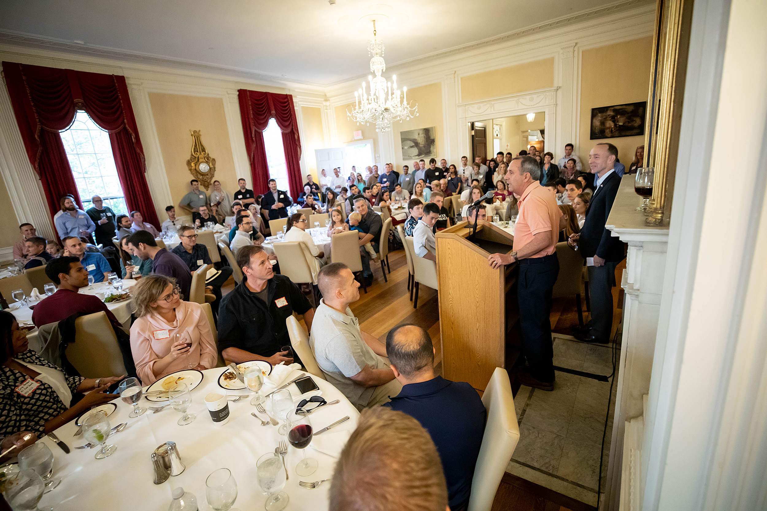 Larry Bacow speaking to dining room