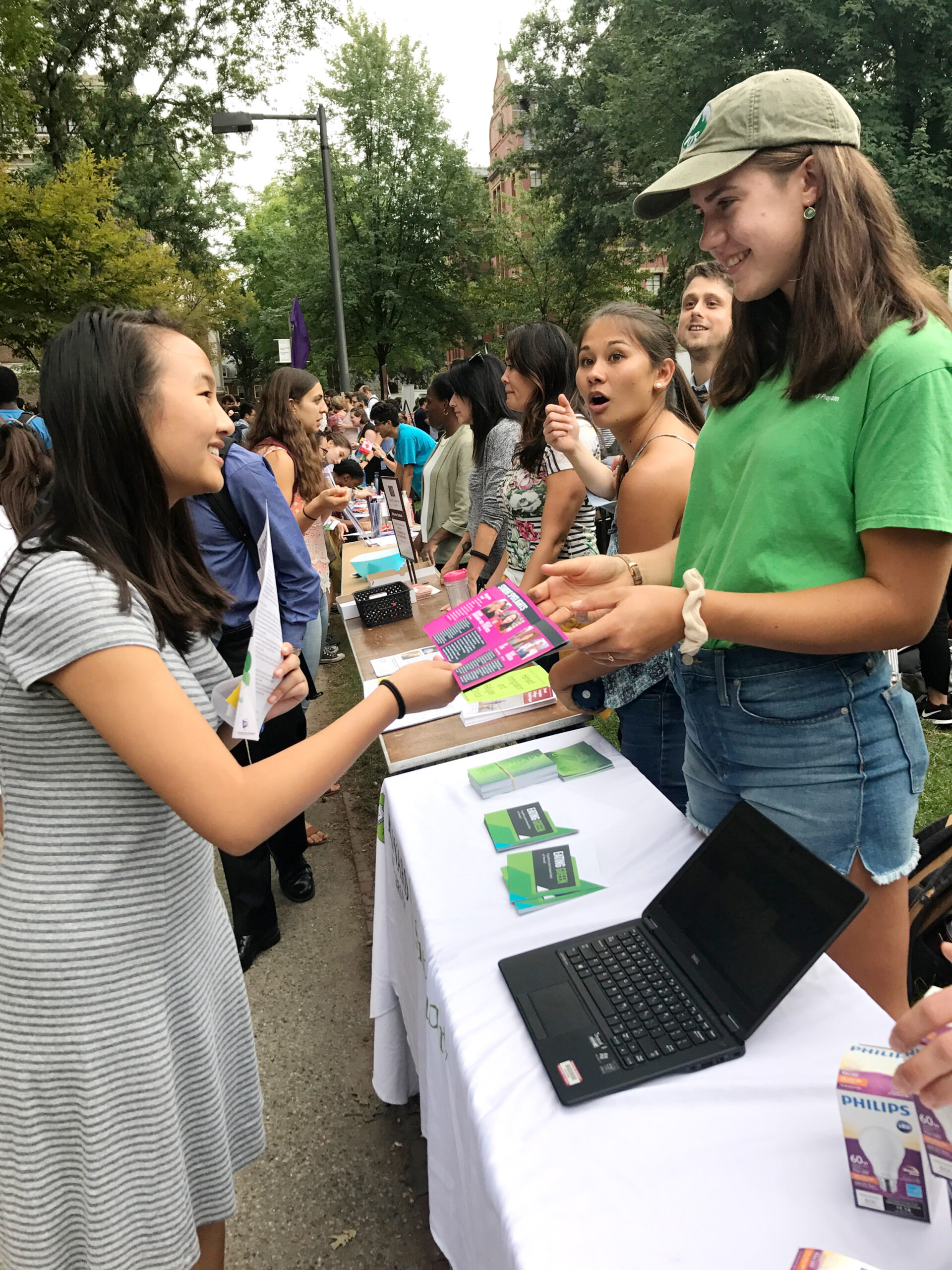 student at activity booth