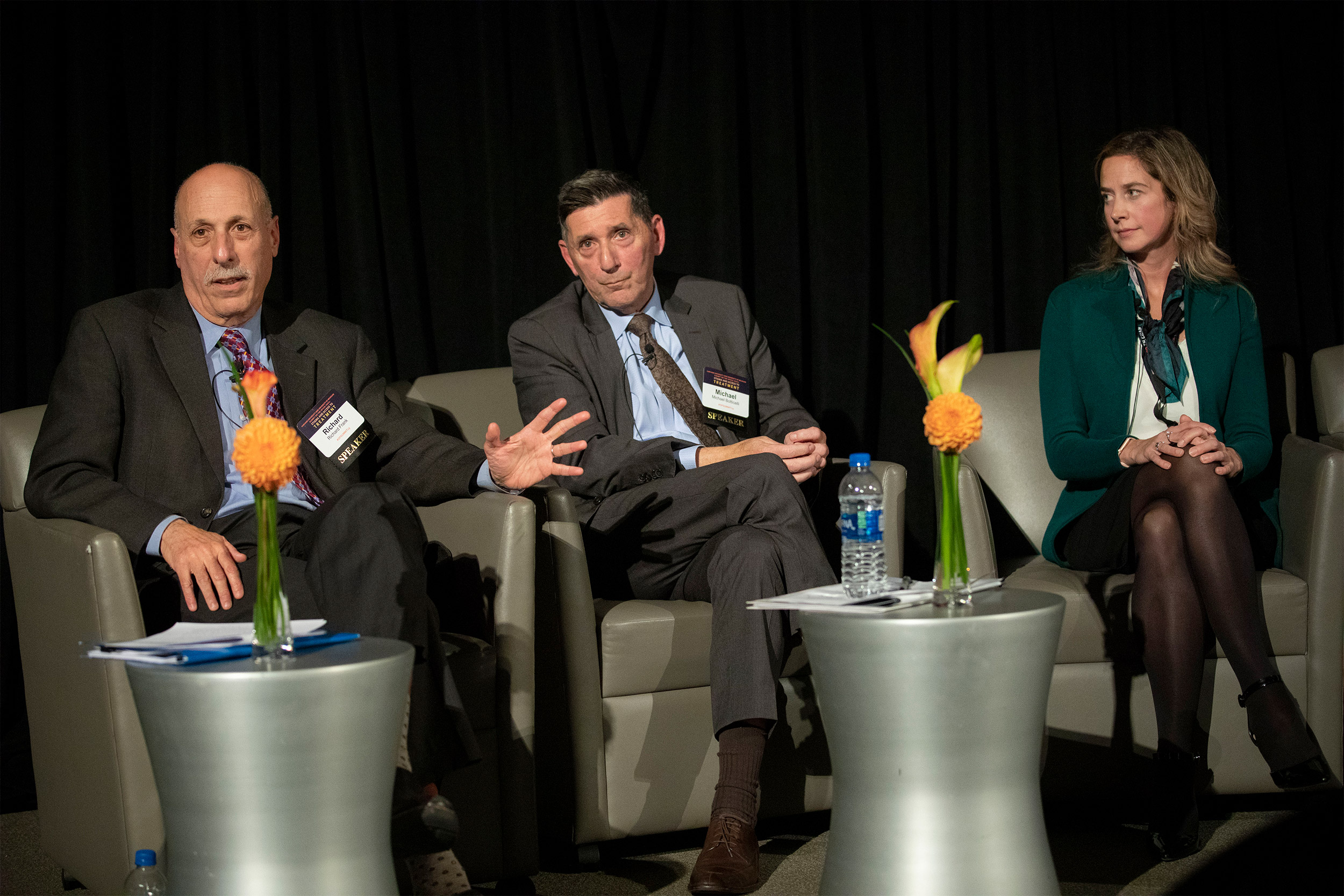 Richard Frank, HMS (from left), Michael Botticelli, Boston Medical Center, and Amy Bohnert, Univ. of Michigan speak inside the Martin Conference Center in the New