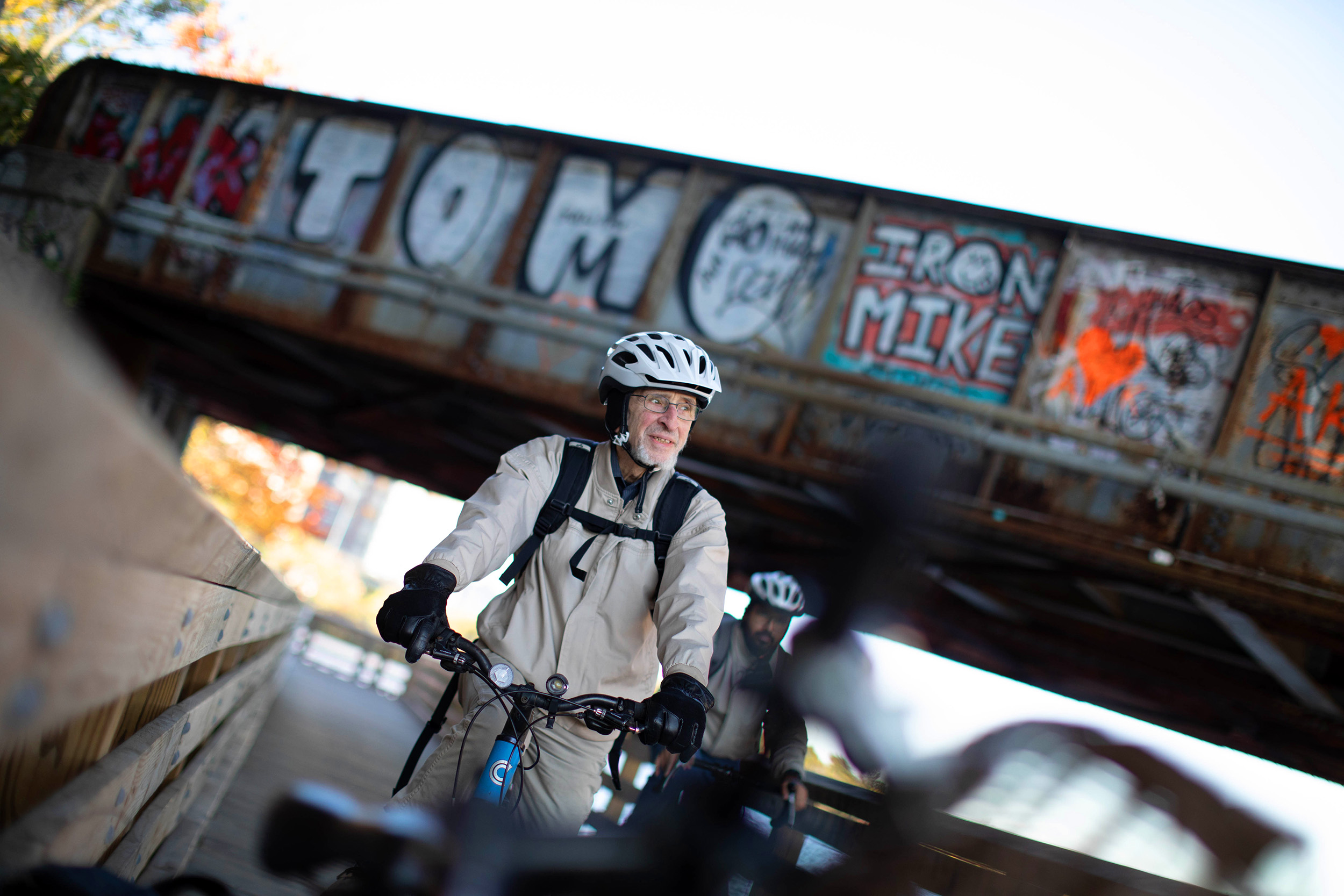 Jonathan Beckwith rides his bicycle to work.