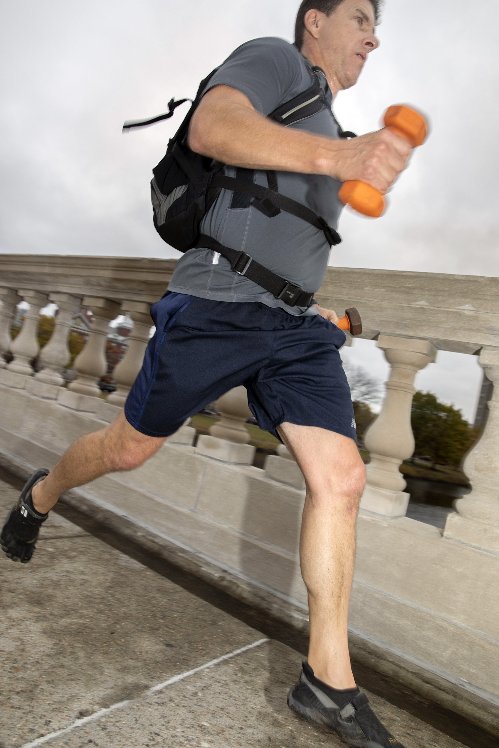 Joseph Henrich runs to work across the Weeks Bridge.