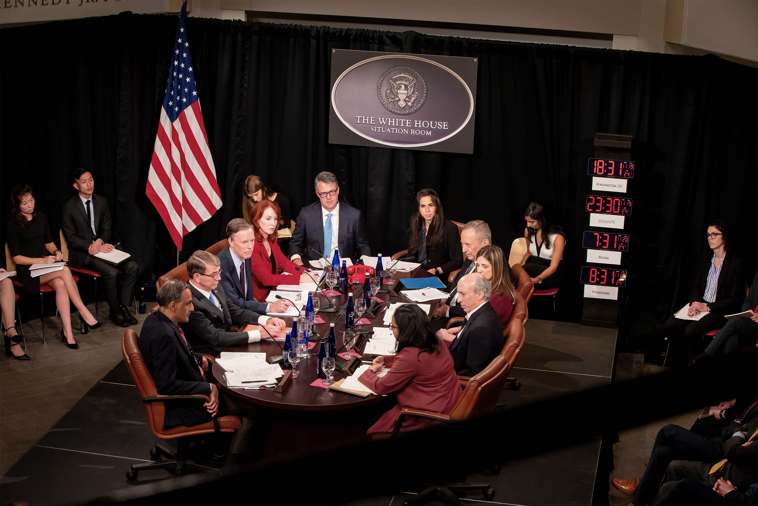 People sitting around a conference table.