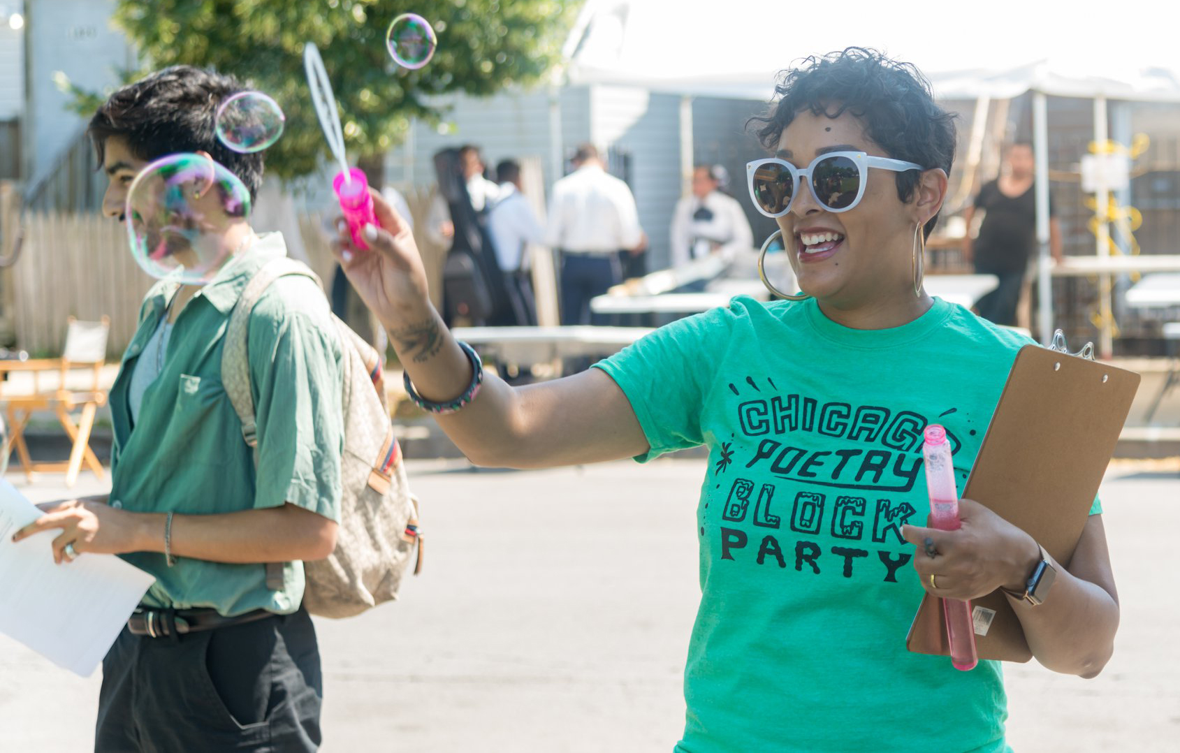 Eve blowing bubbles at a Chicago block party