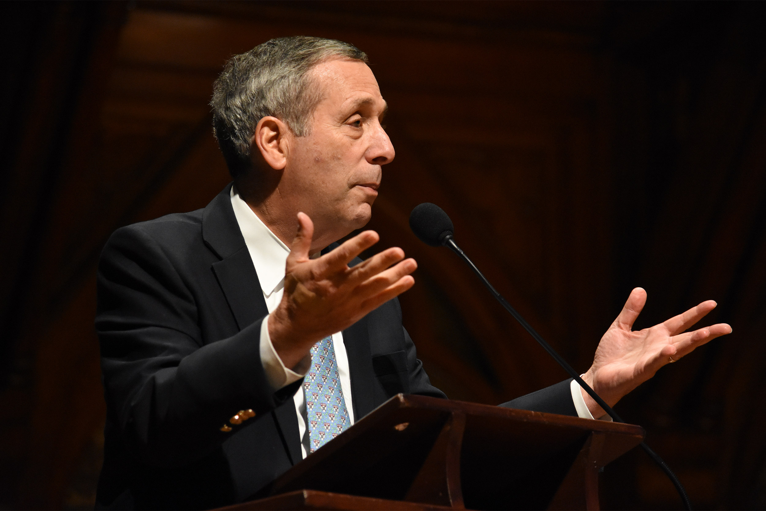 President Larry Bacow at podium