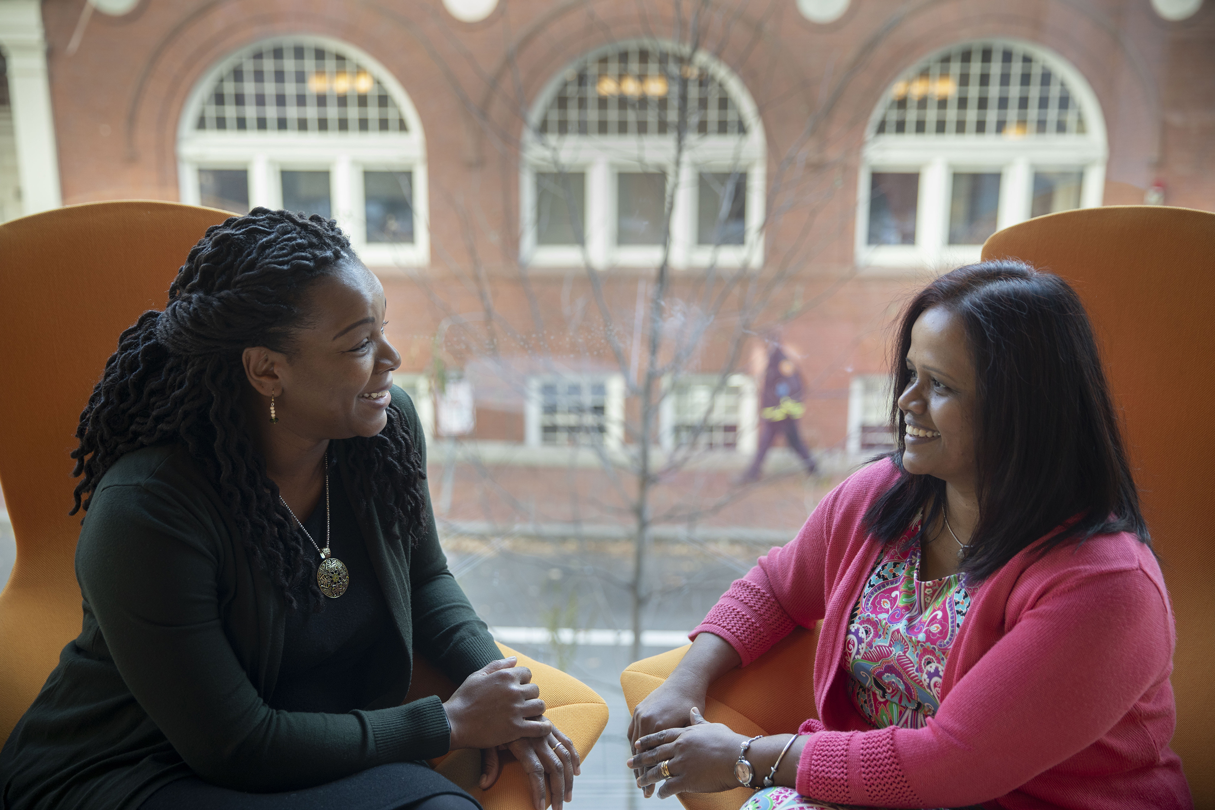 Mentor and mentee sitting together.
