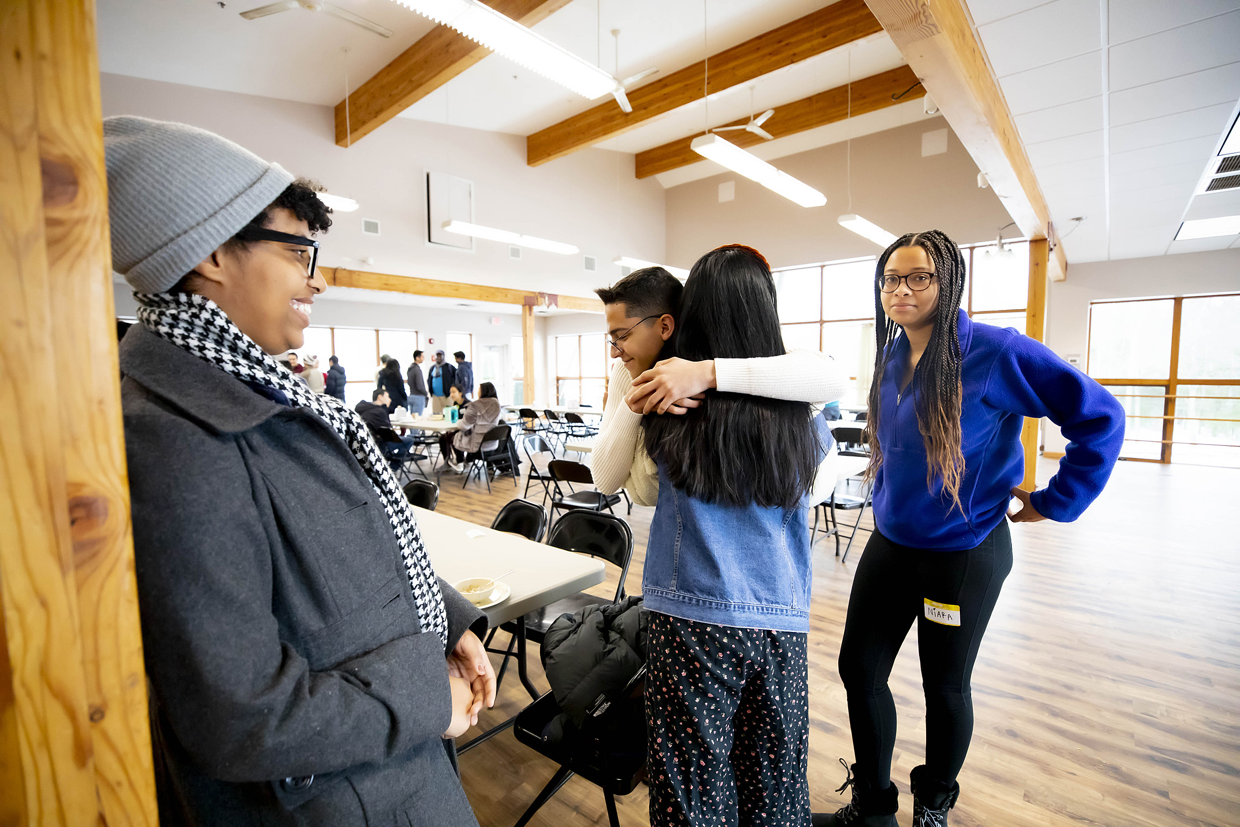 Students hugging.