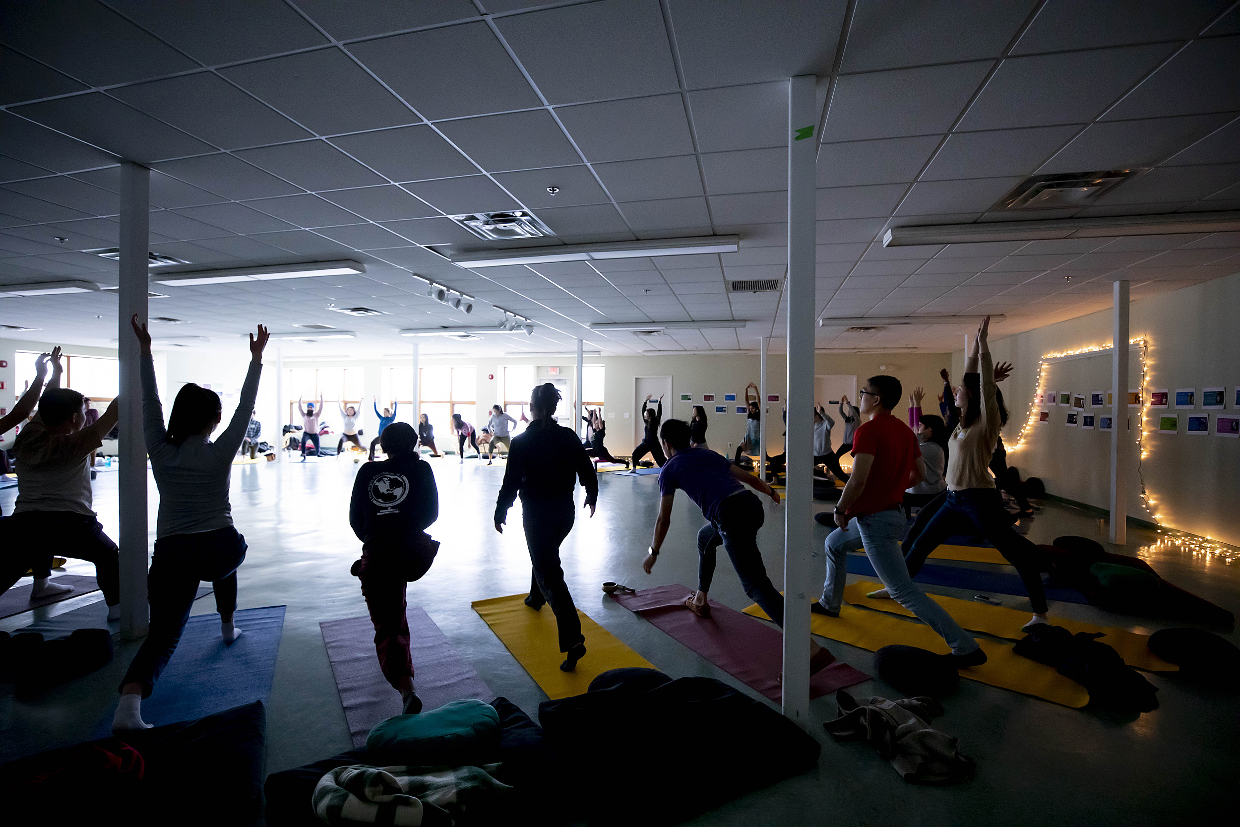 People doing yoga.