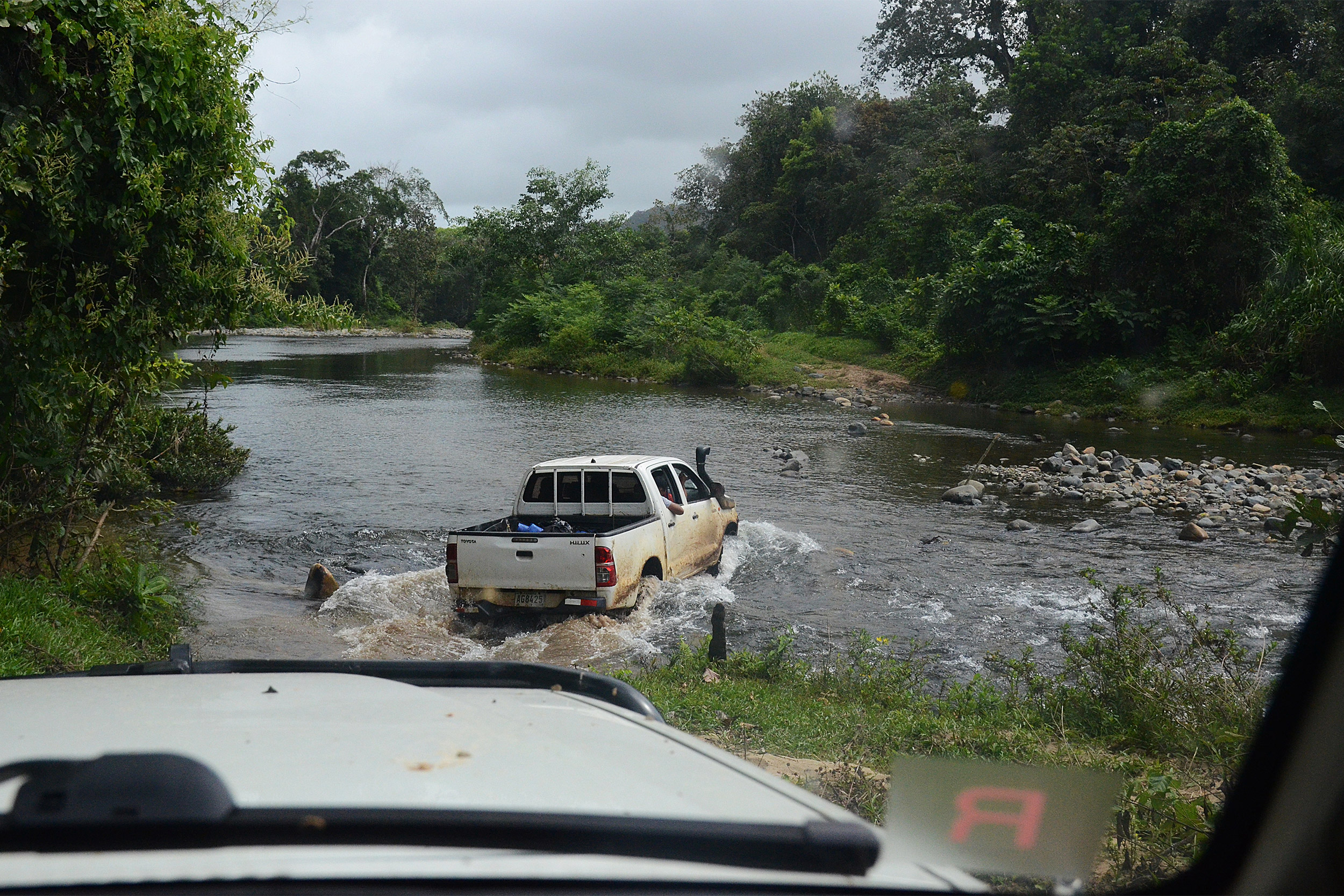 Truck crossing a river.