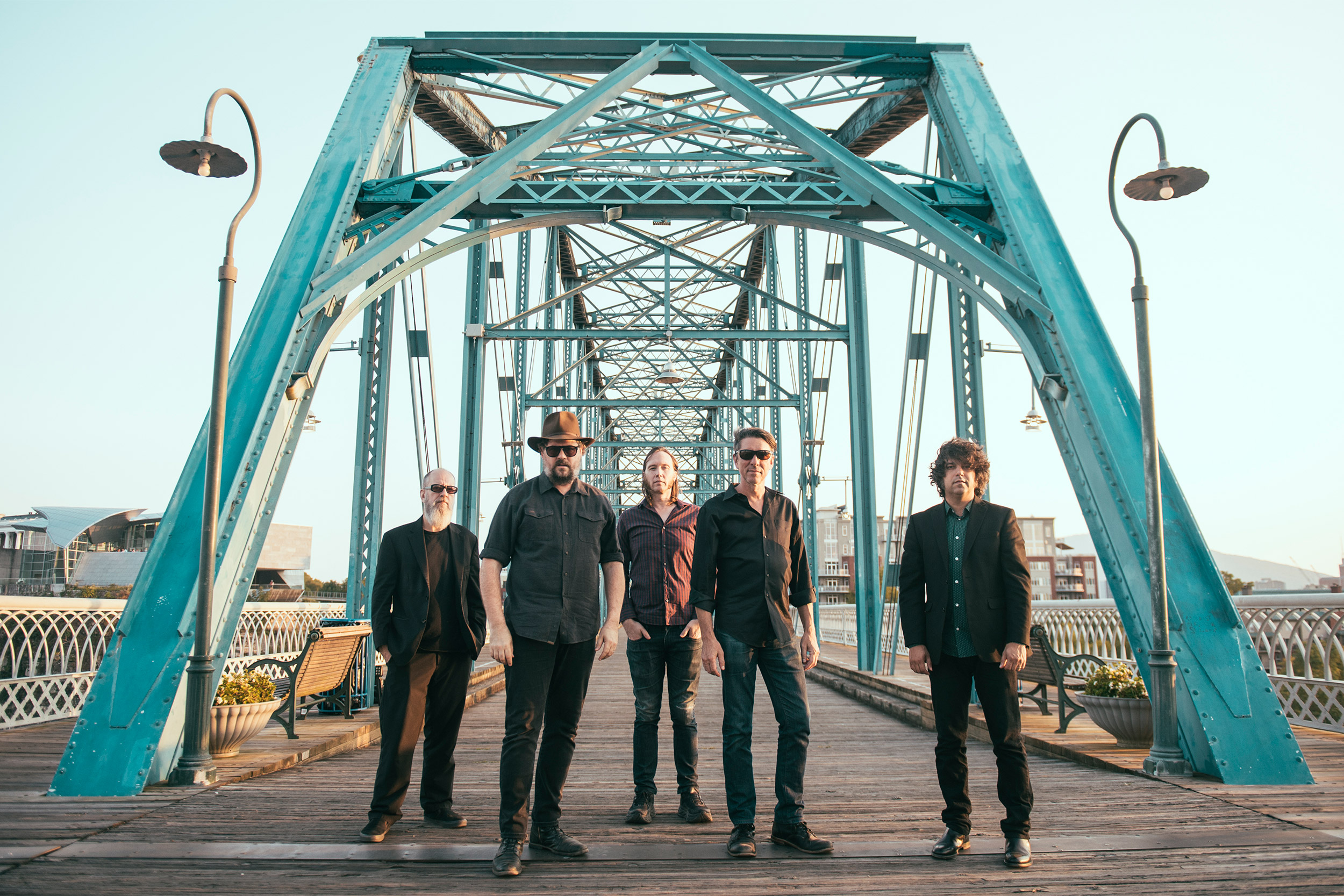 Music group Drive-By Truckers pictured on a bridge.