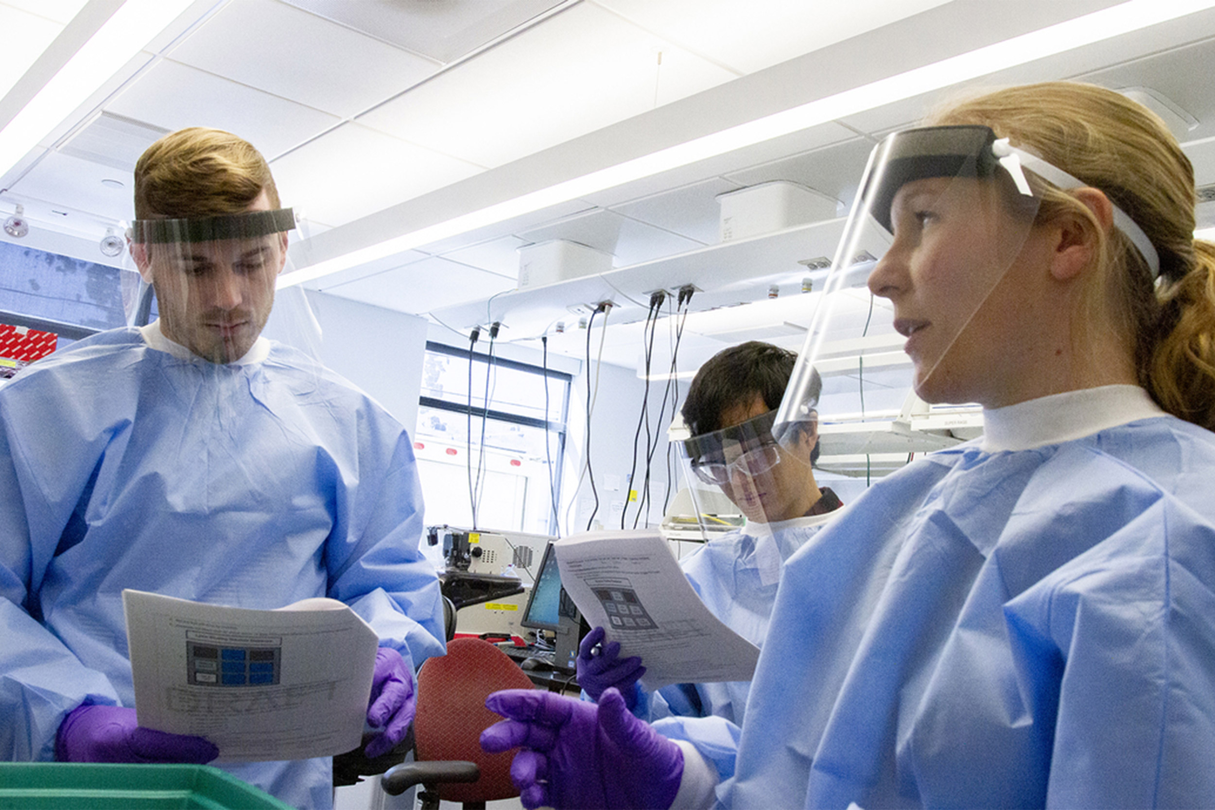 Researcher in protective gear.