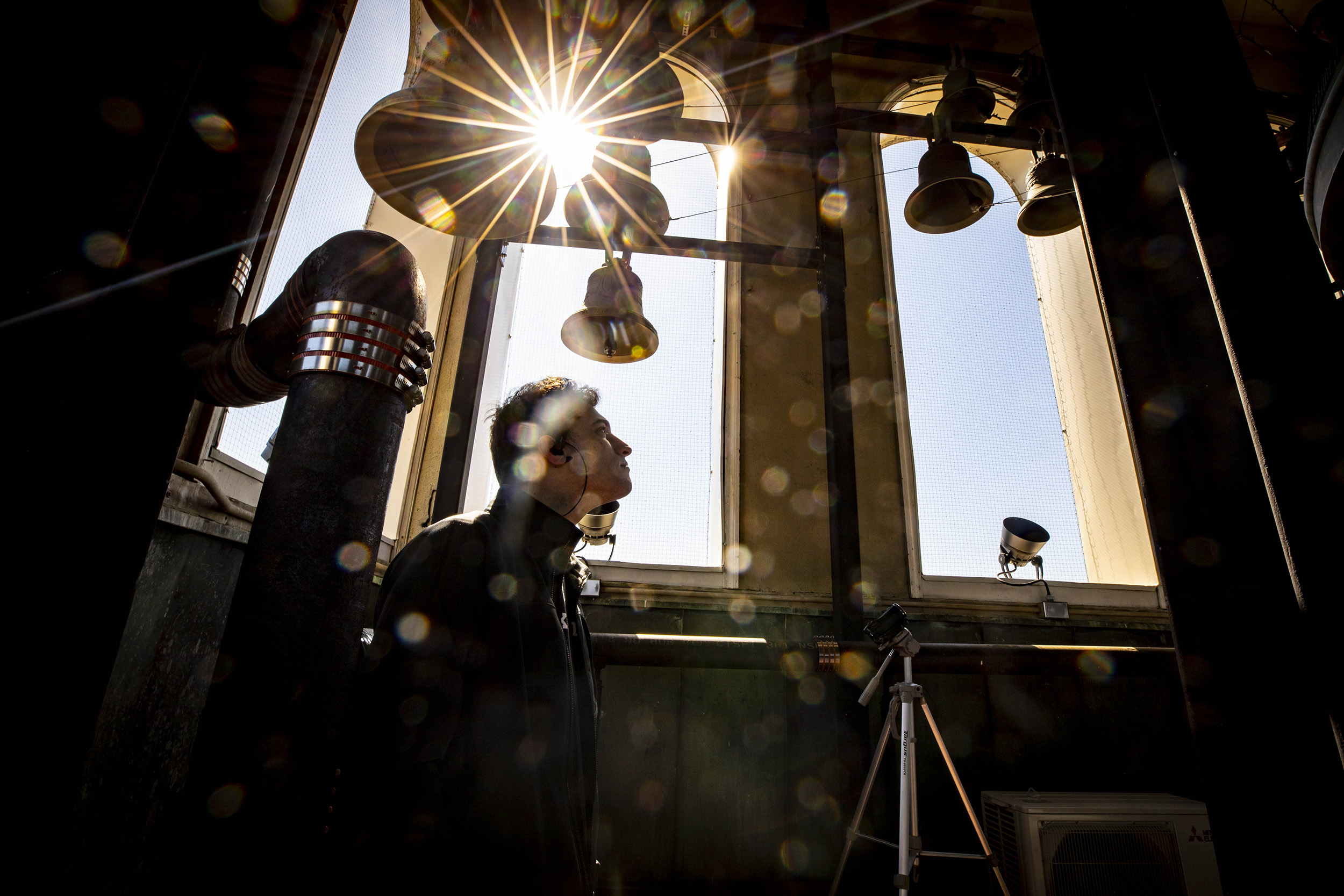 Student listening to the Lowell House bells.