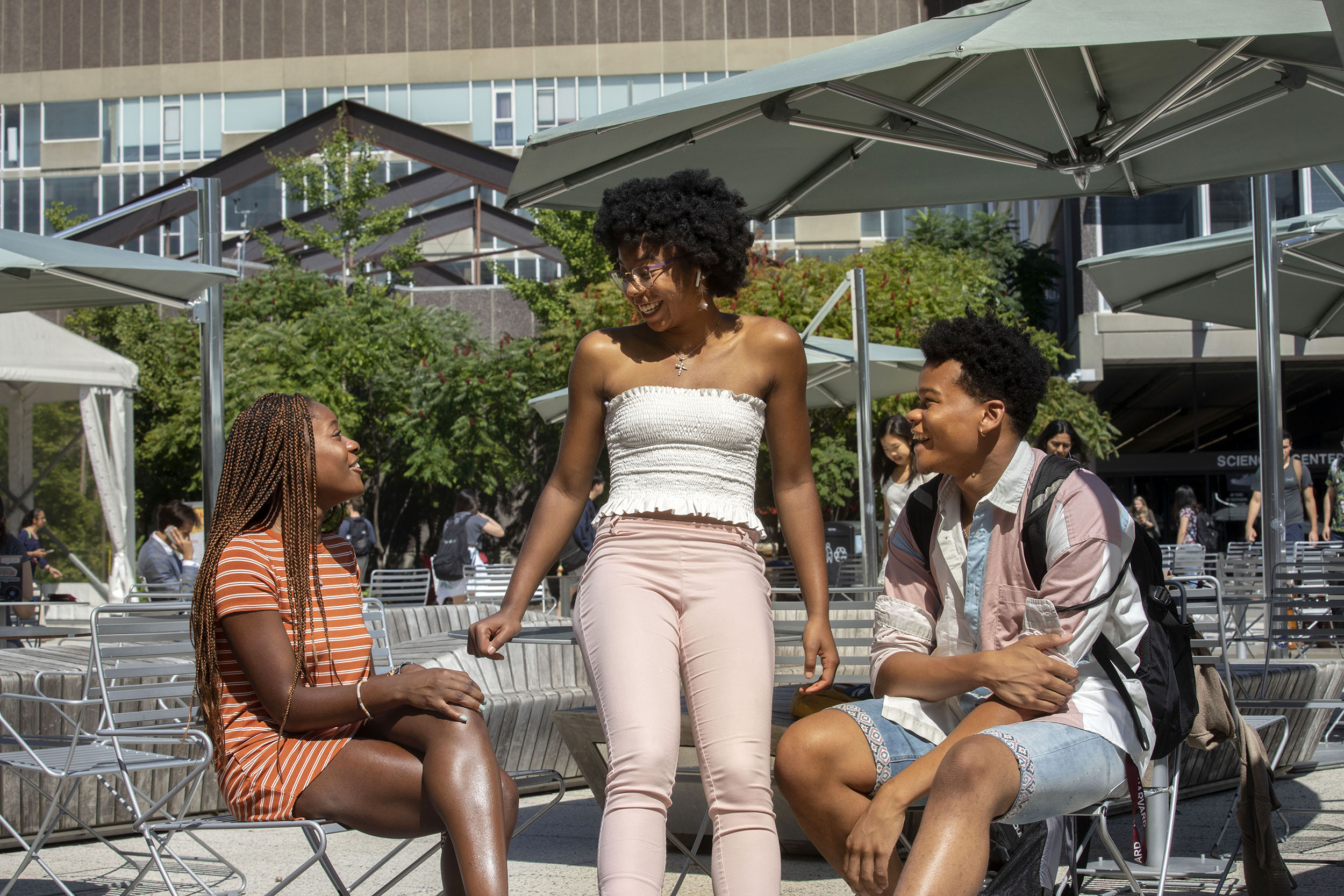 Marissa Joseph ’23 (from left) Jarah Cotton ’23, and Christian Porter ’23 chat in the Science Center Plaza.