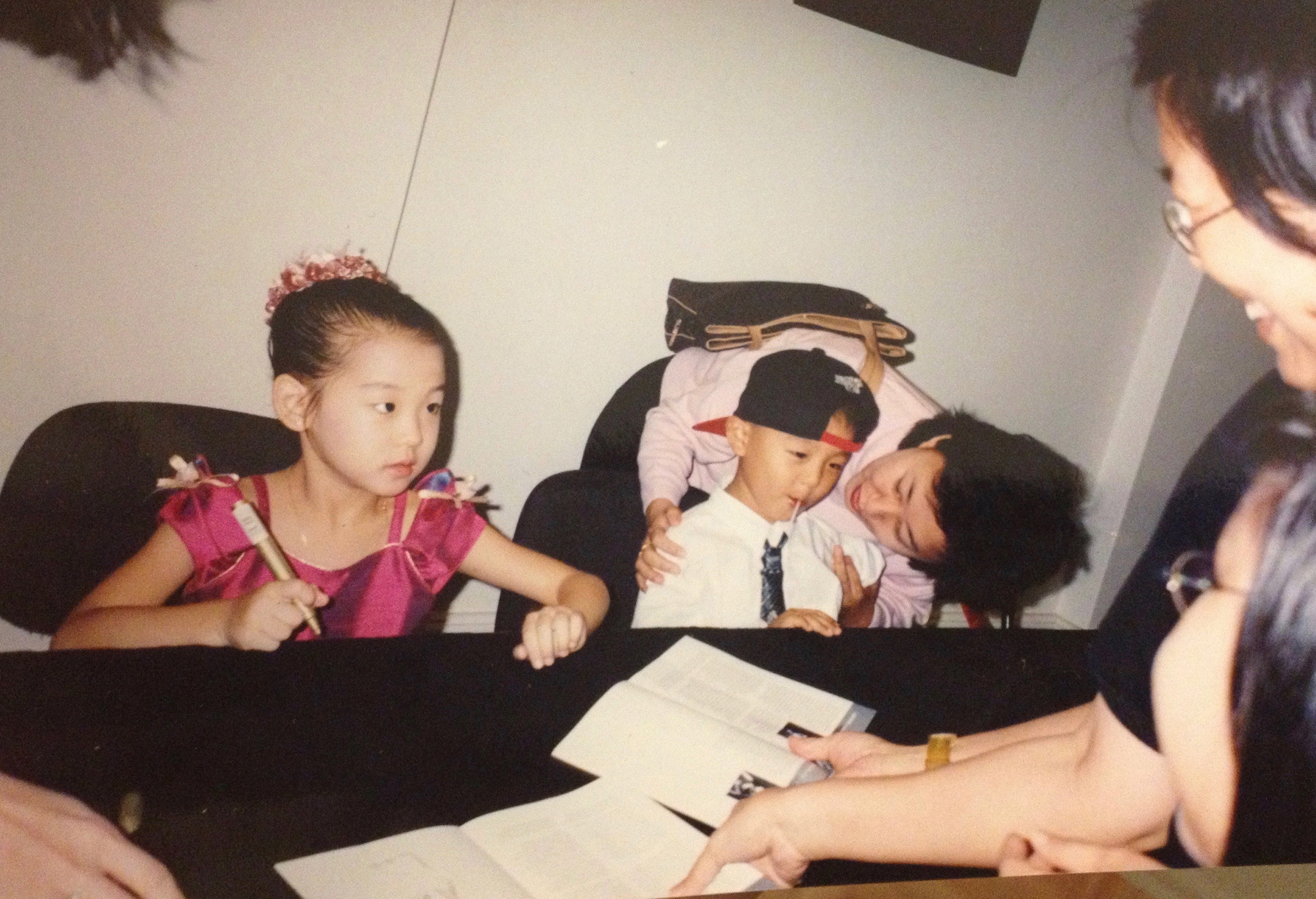 Anna signing programs (in marker) after her first concert