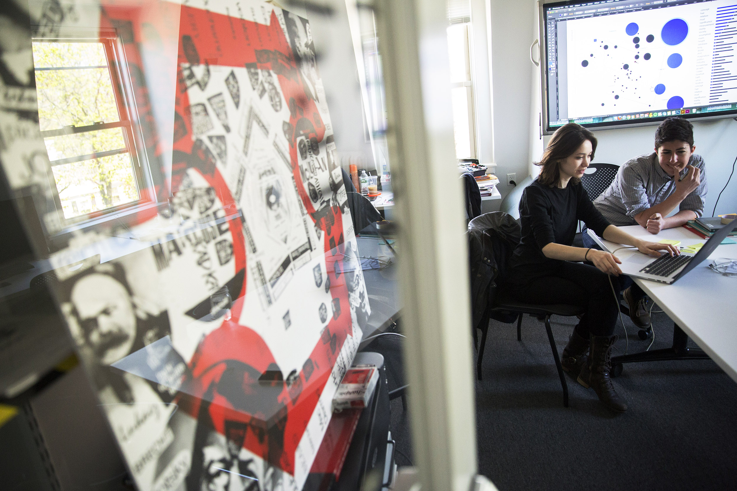 Krystelle Denis and Jessica Yurkofsky work in metaLAB studio.