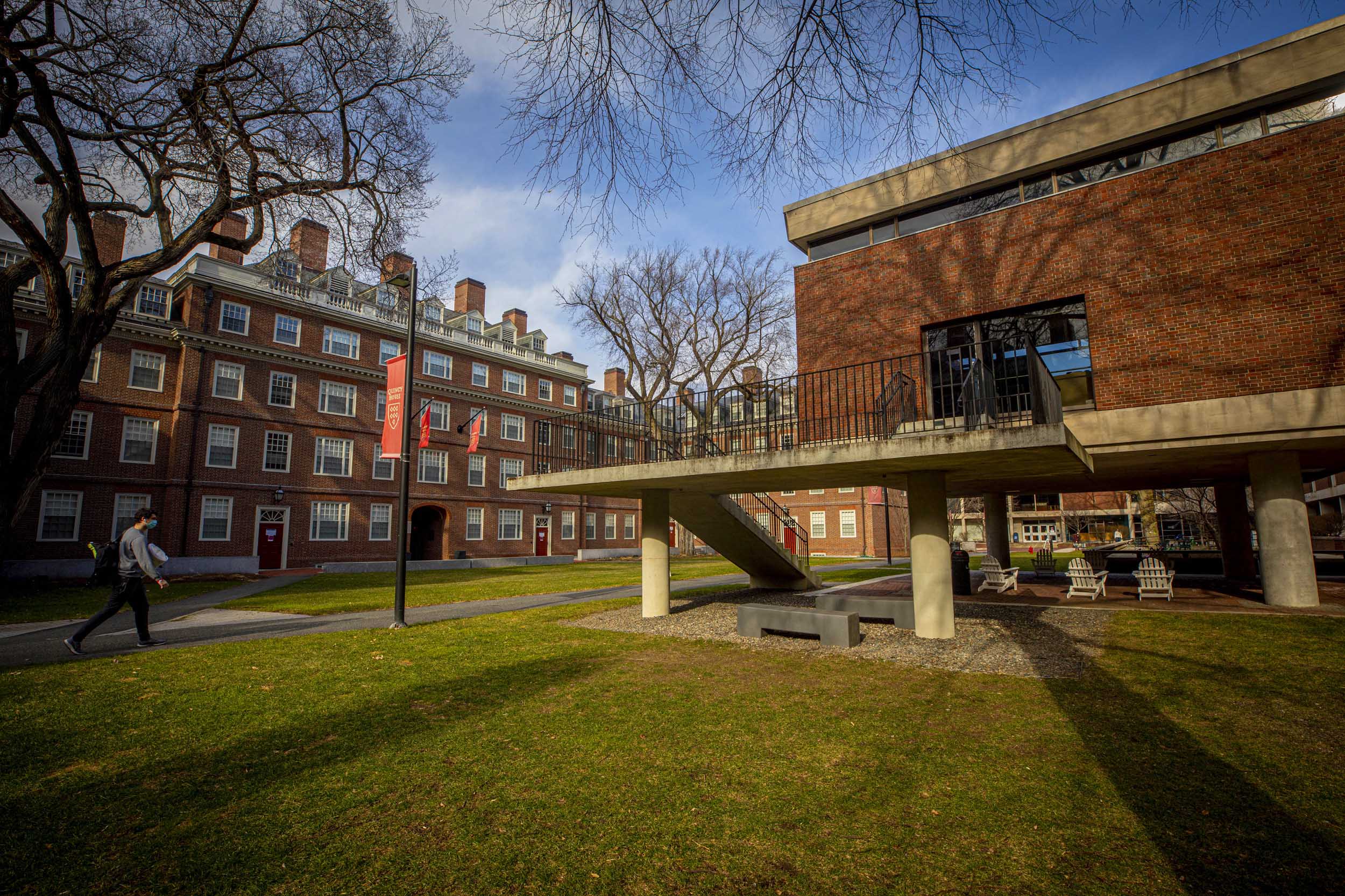 The boxy, modernist side of Quincy House, right, was added in 1958; while Stone Hall, previously called Old Quincy.