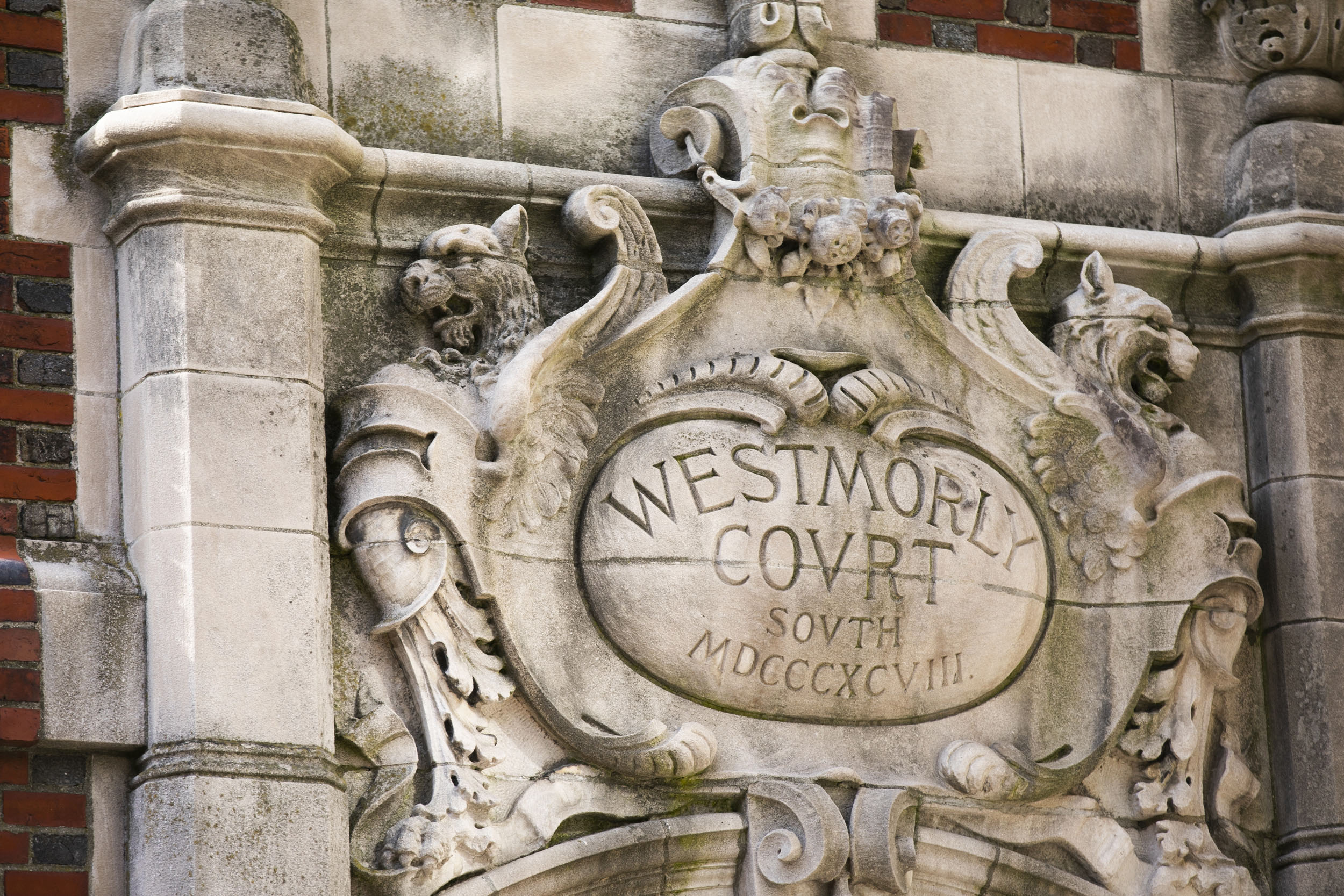 Griffins abound along the Bow Street entrance to Westmorly Court at Adams House.