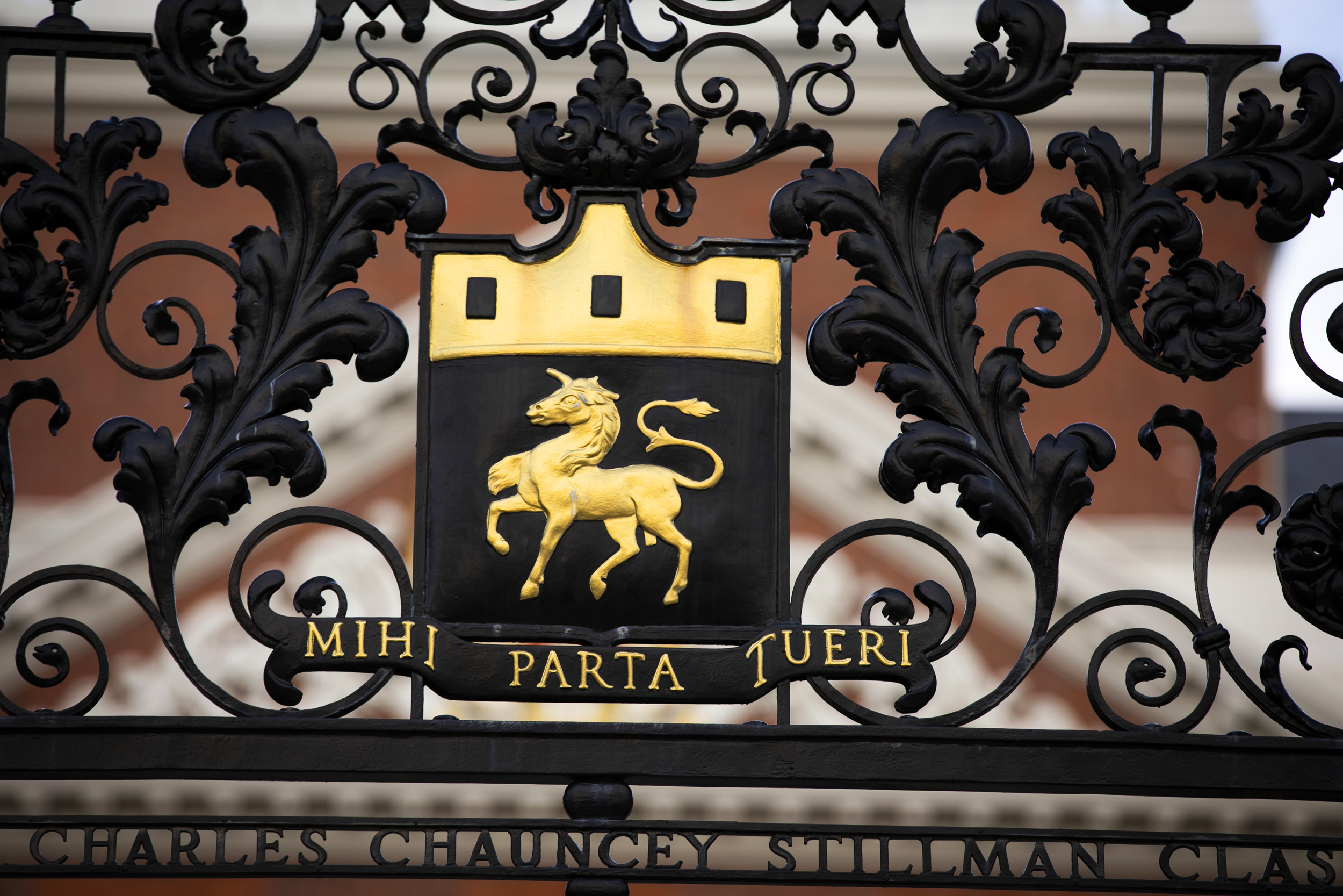 A golden unicorn bedecks the Dunster House gate.