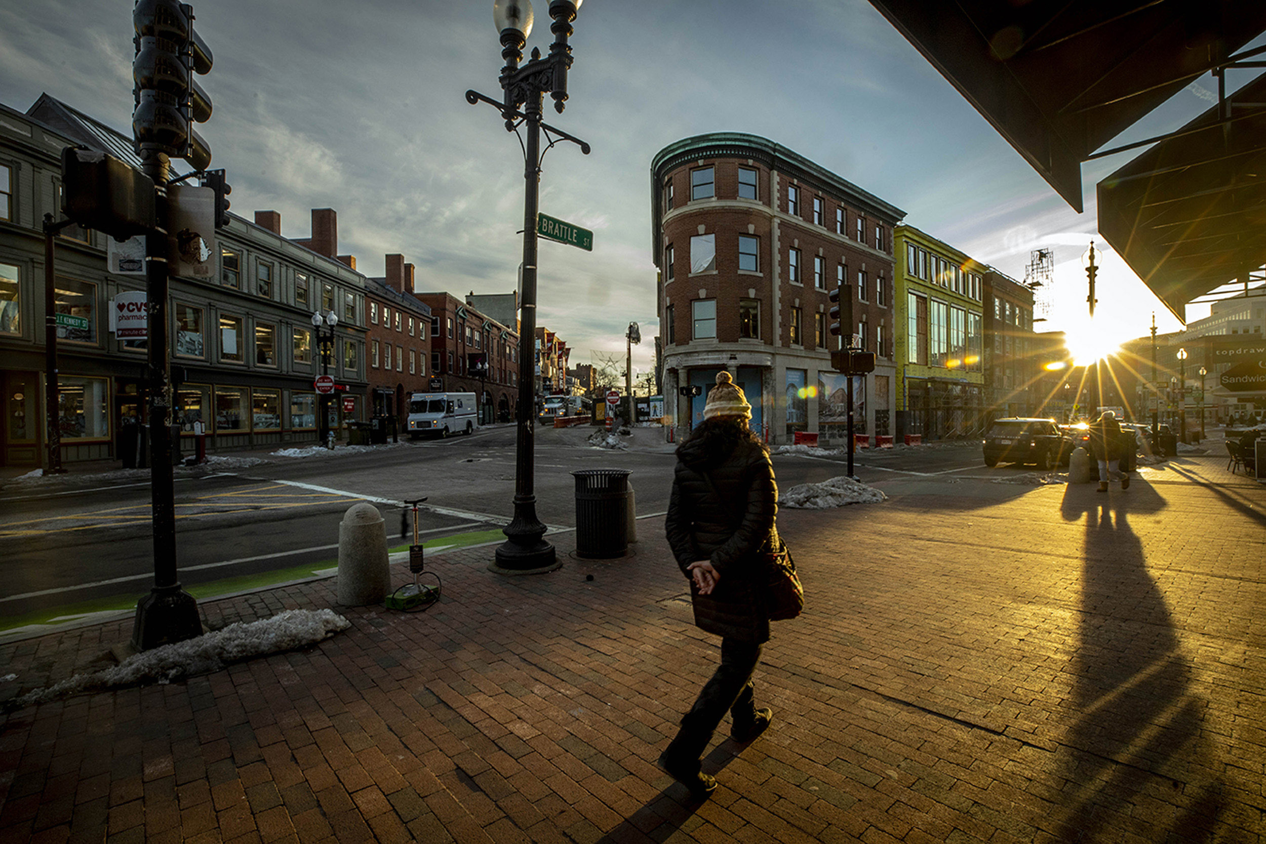 The Abbot Building in the center of Harvard Square is pictured at sunset.