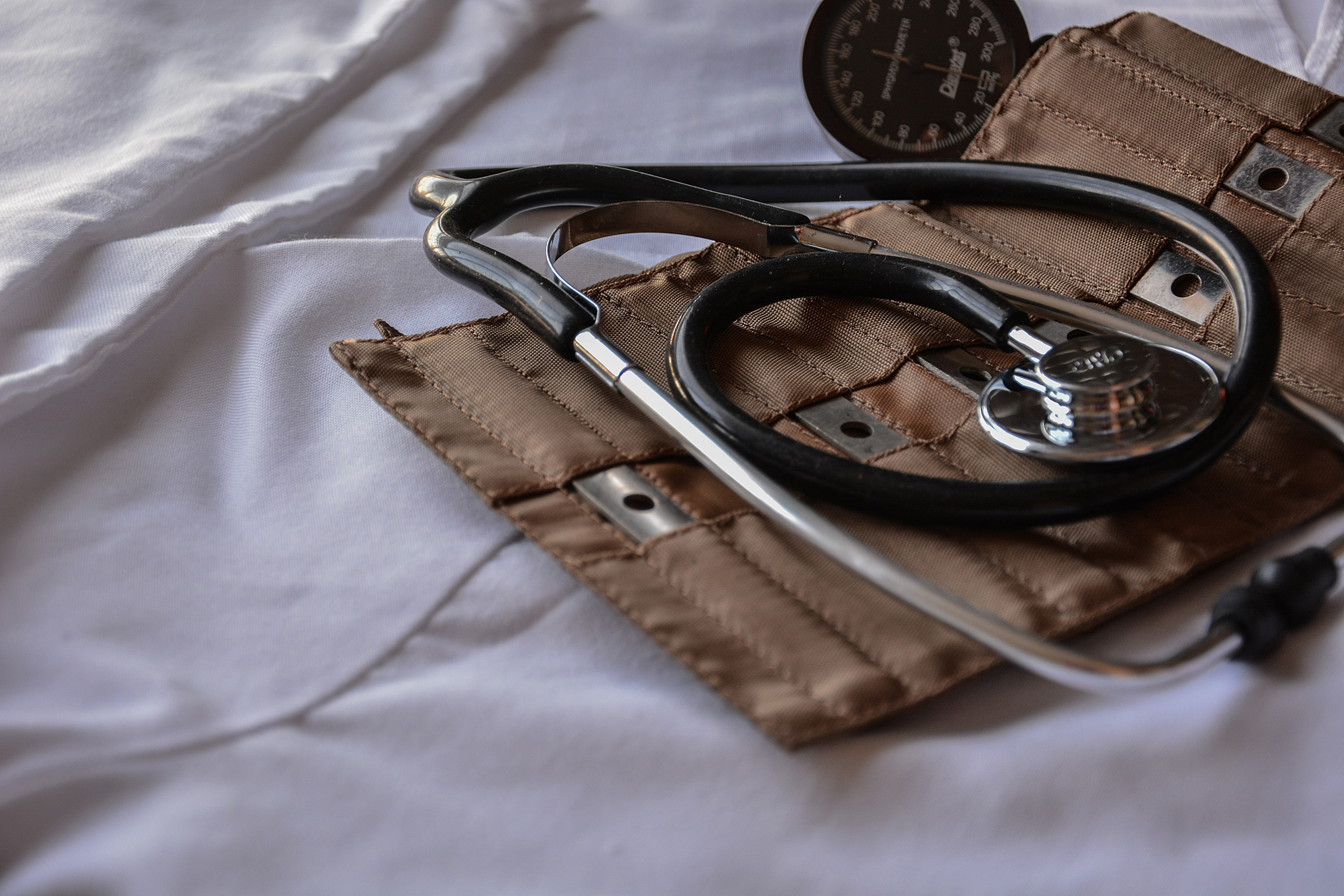 Stethoscope and blood pressure cuff.