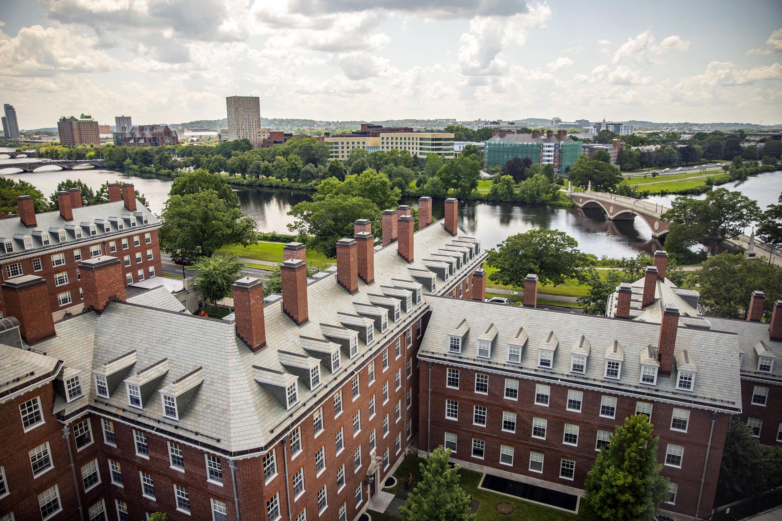 Dunster House sits attractively along the Charles River and the Weeks Footbridge.