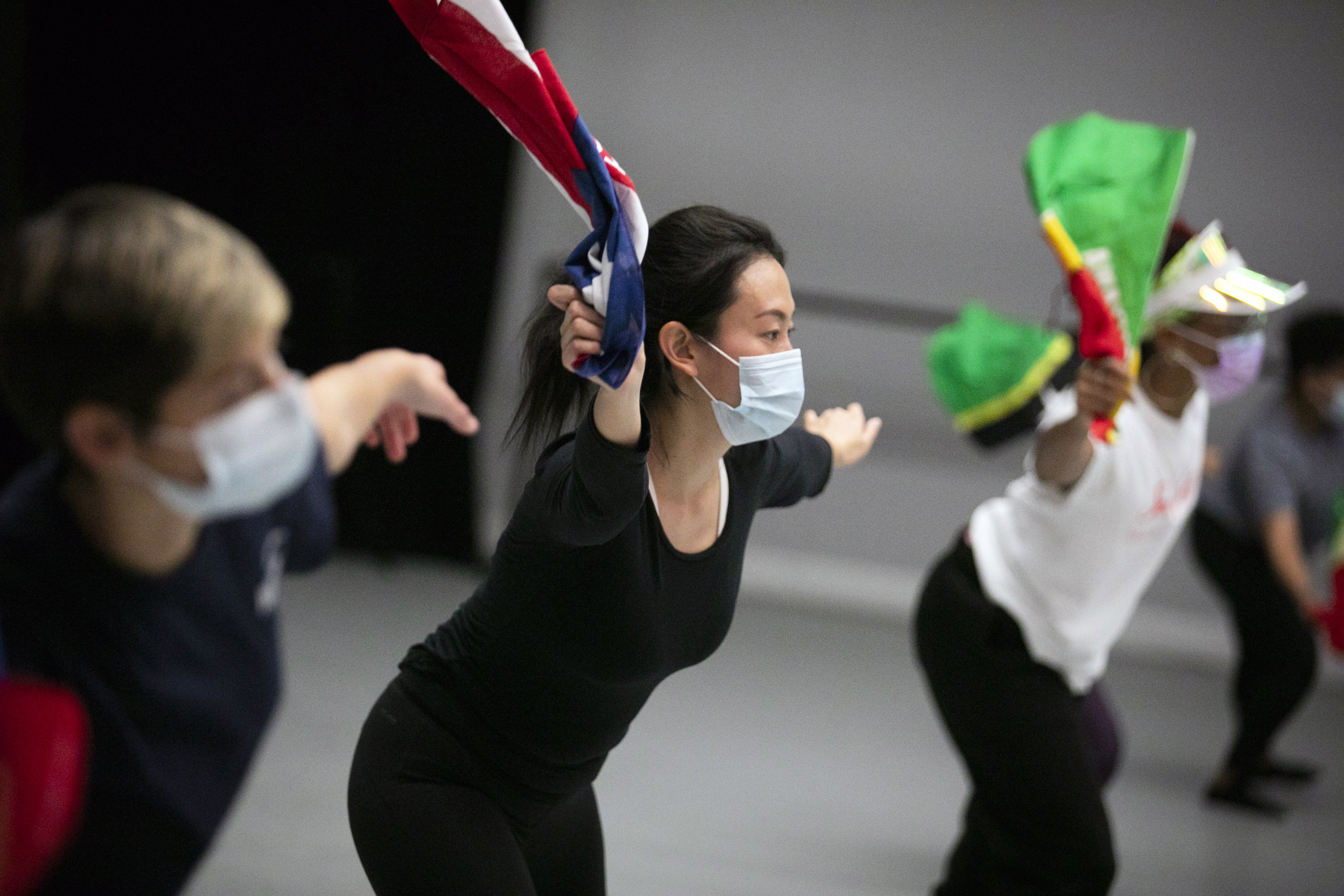 Rui Sun dances during Soca Fusion class.