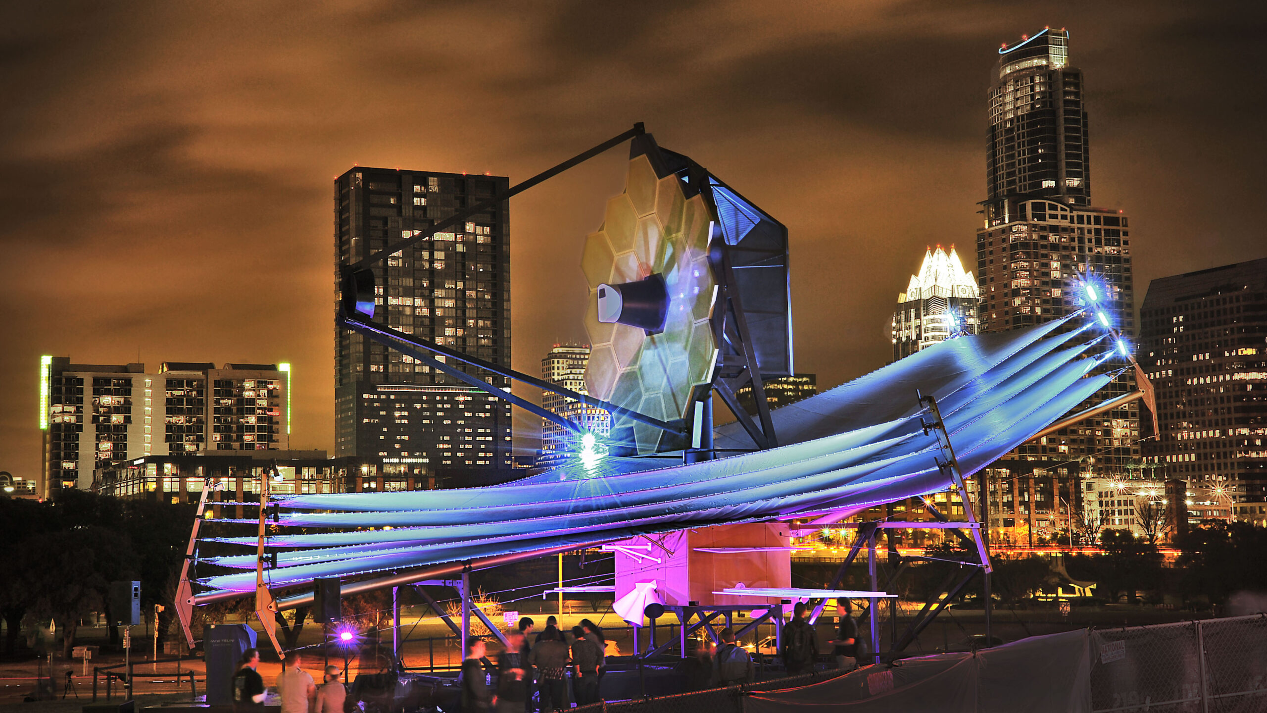 James Webb Space Telescope model at South by Southwest with Austin skyline in back.