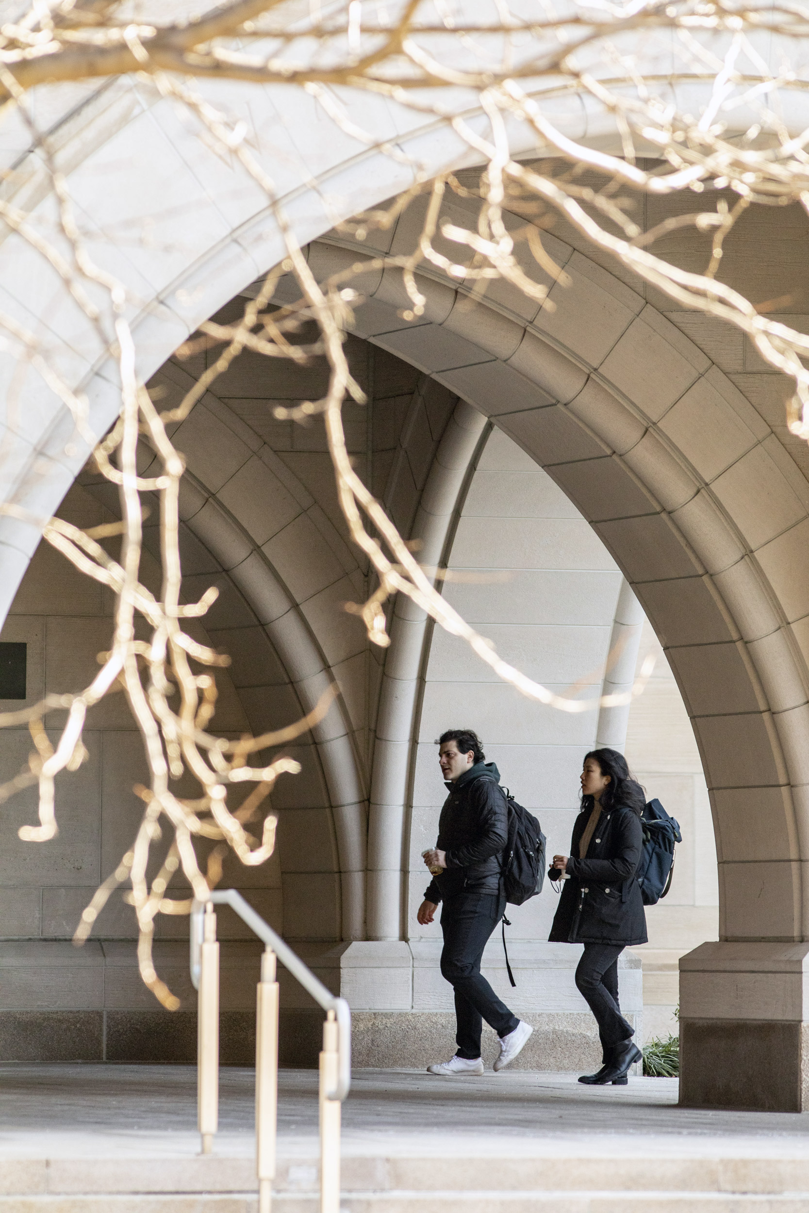 Students walk into Wasserstein Hall.