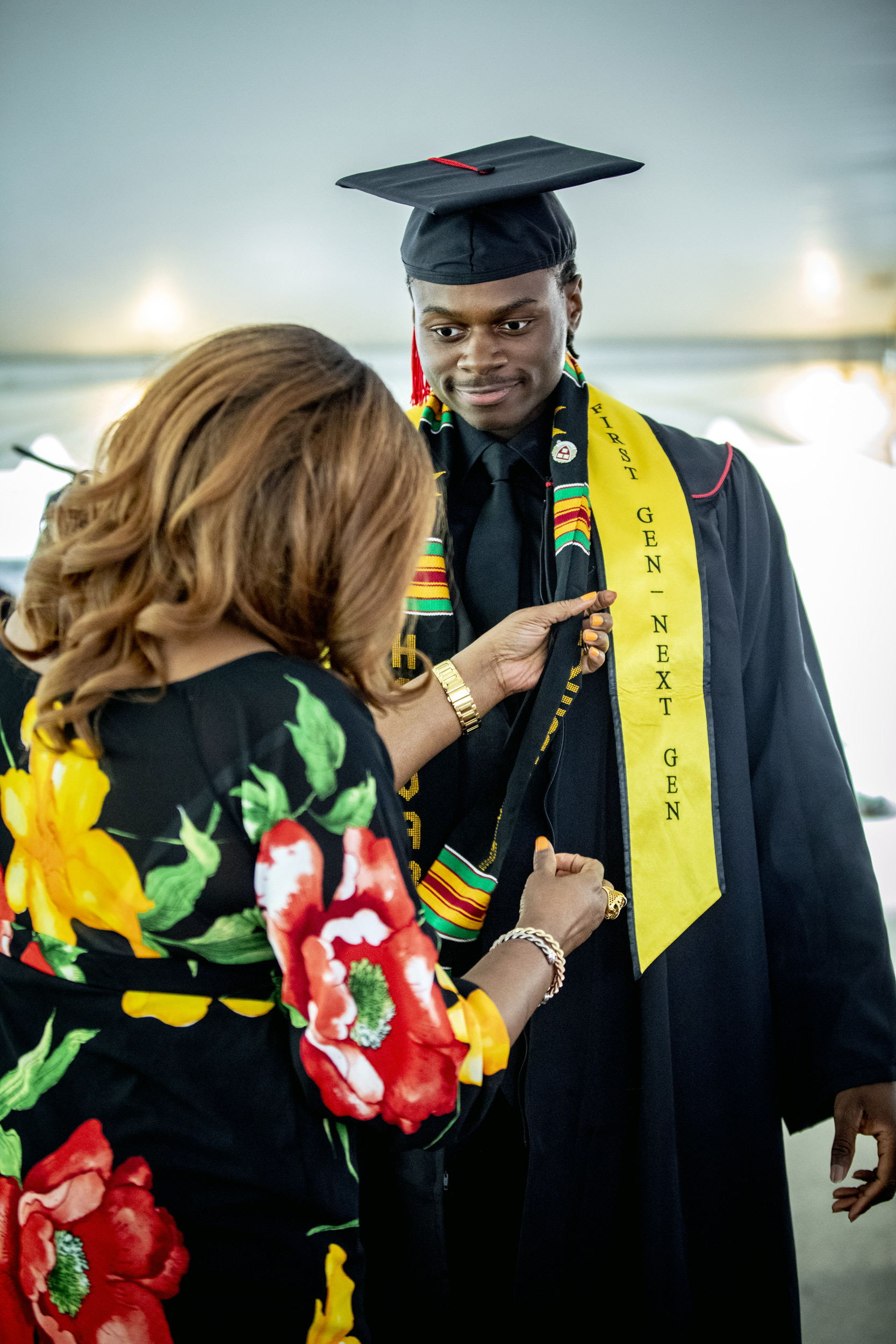 Derrick Ochiagha ’22 shares a moment with his mom Peace Ochiagha at Mather House.