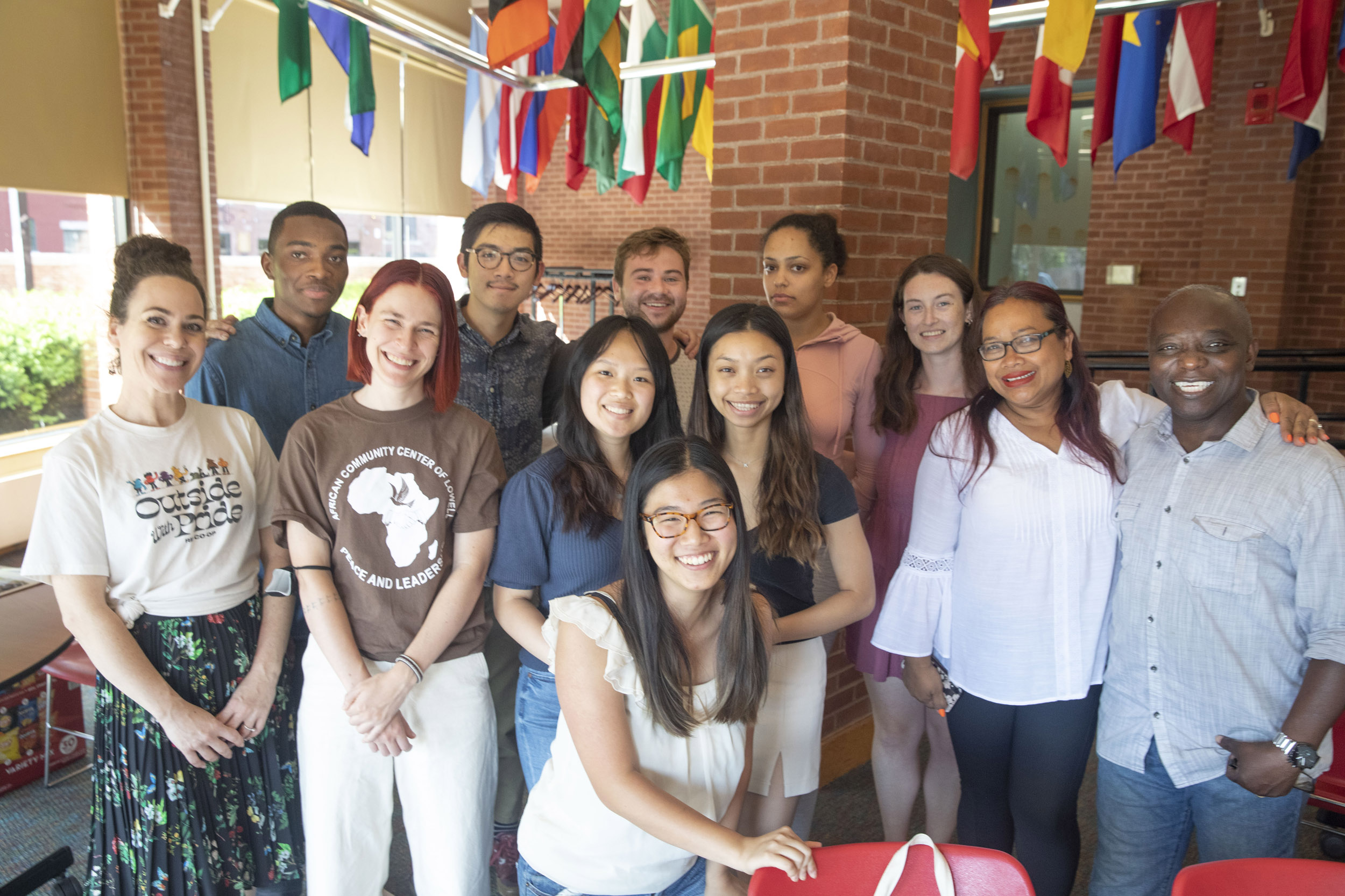 Participants in Harvard's Welcoming Refugees program with members of Lowell community at a Town Hall.