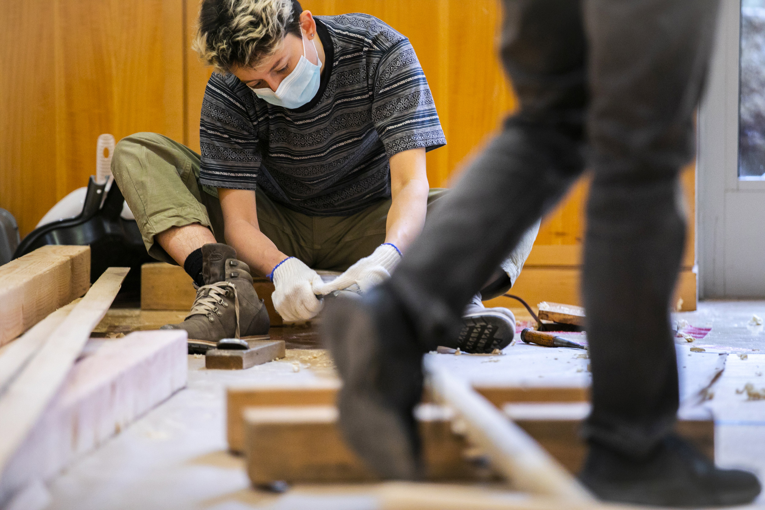 Shir Lovett-Graff refines a handcrafted oar.