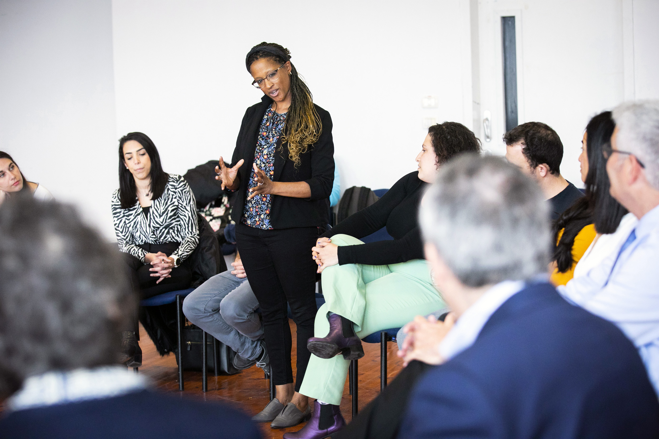 University of Haifa students, including Stephanie K.E. Colley (center), meet President Larry Bacow.