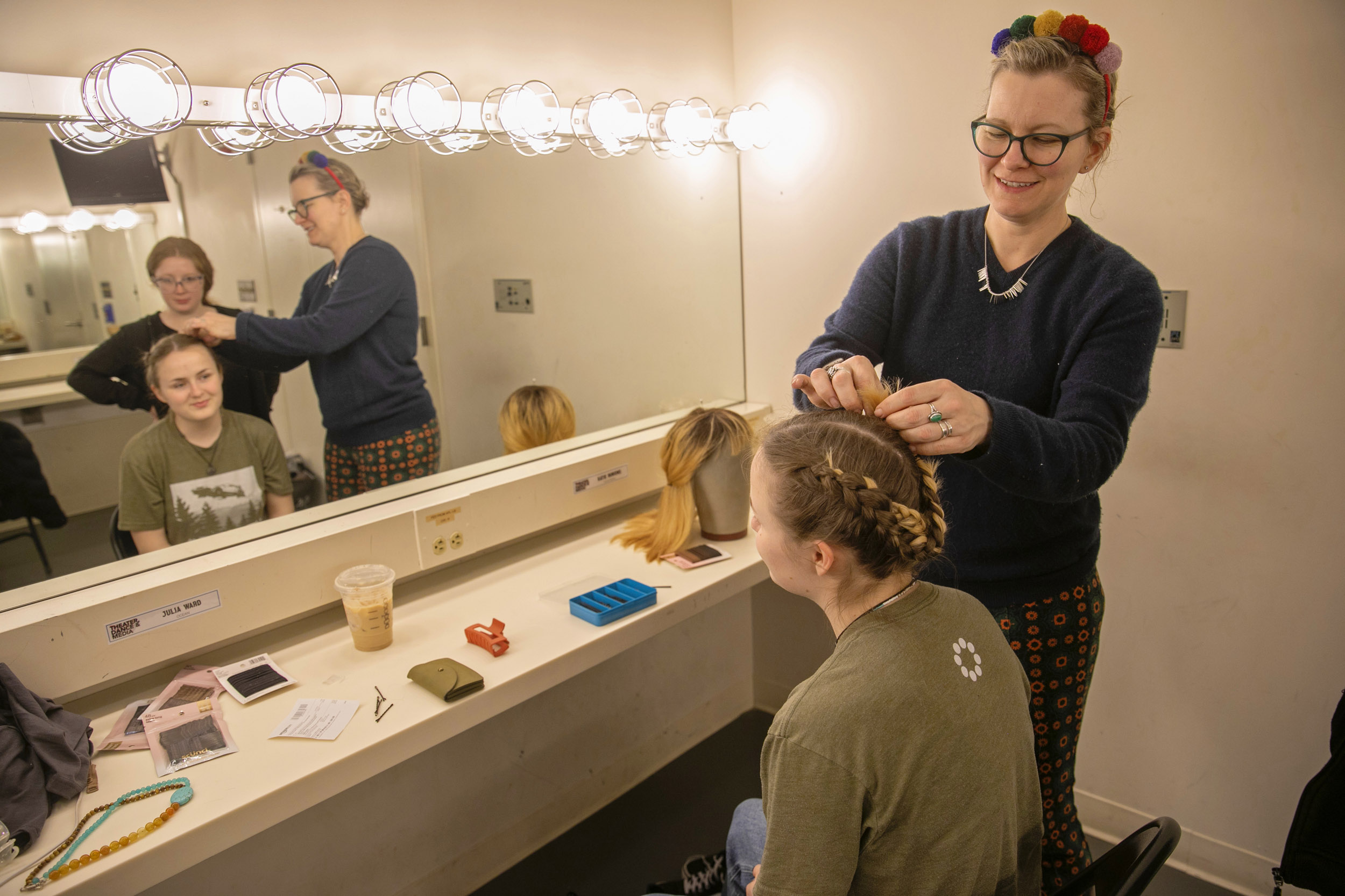 Rachele Padula-Shufelt braids hair for Katie Runions.