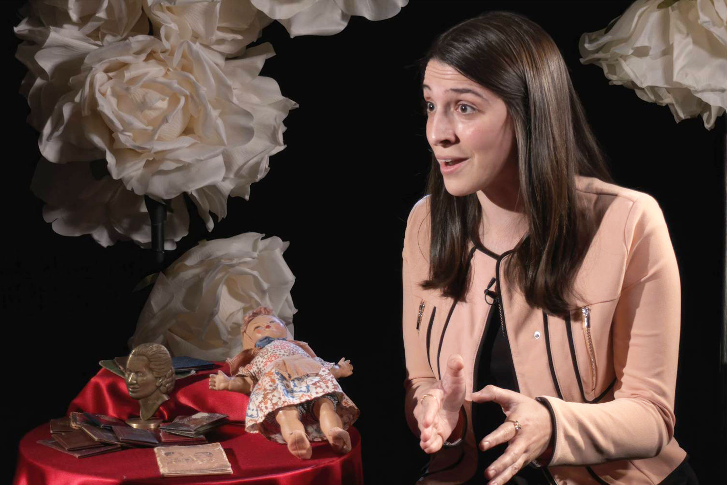 Director Sammi Cannold with a doll that was given out by the Fundación Eva Perón.